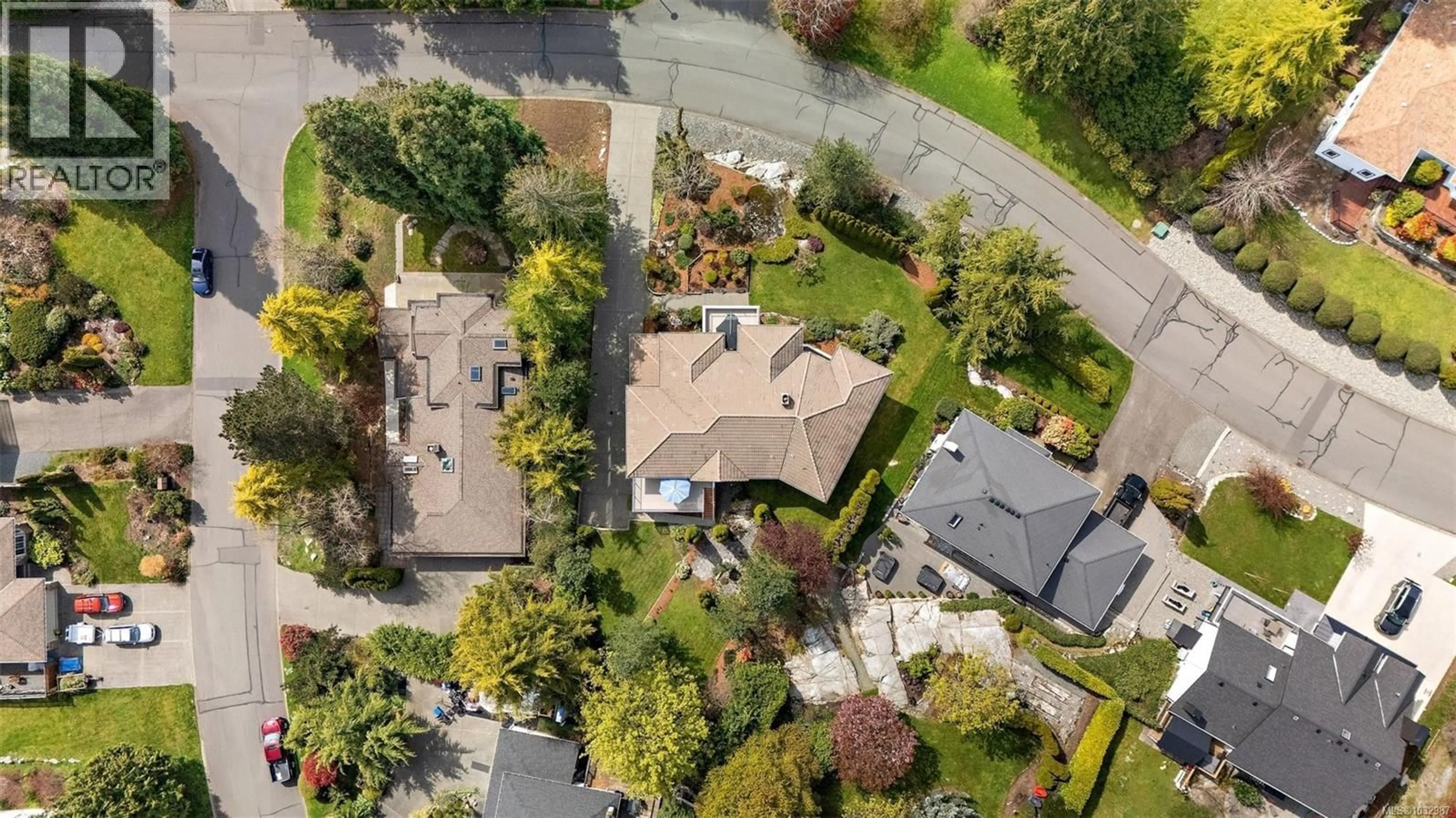 A pic from outside/outdoor area/front of a property/back of a property/a pic from drone, street for 8593 KINGCOME CRESCENT, North Saanich British Columbia V8L5C4