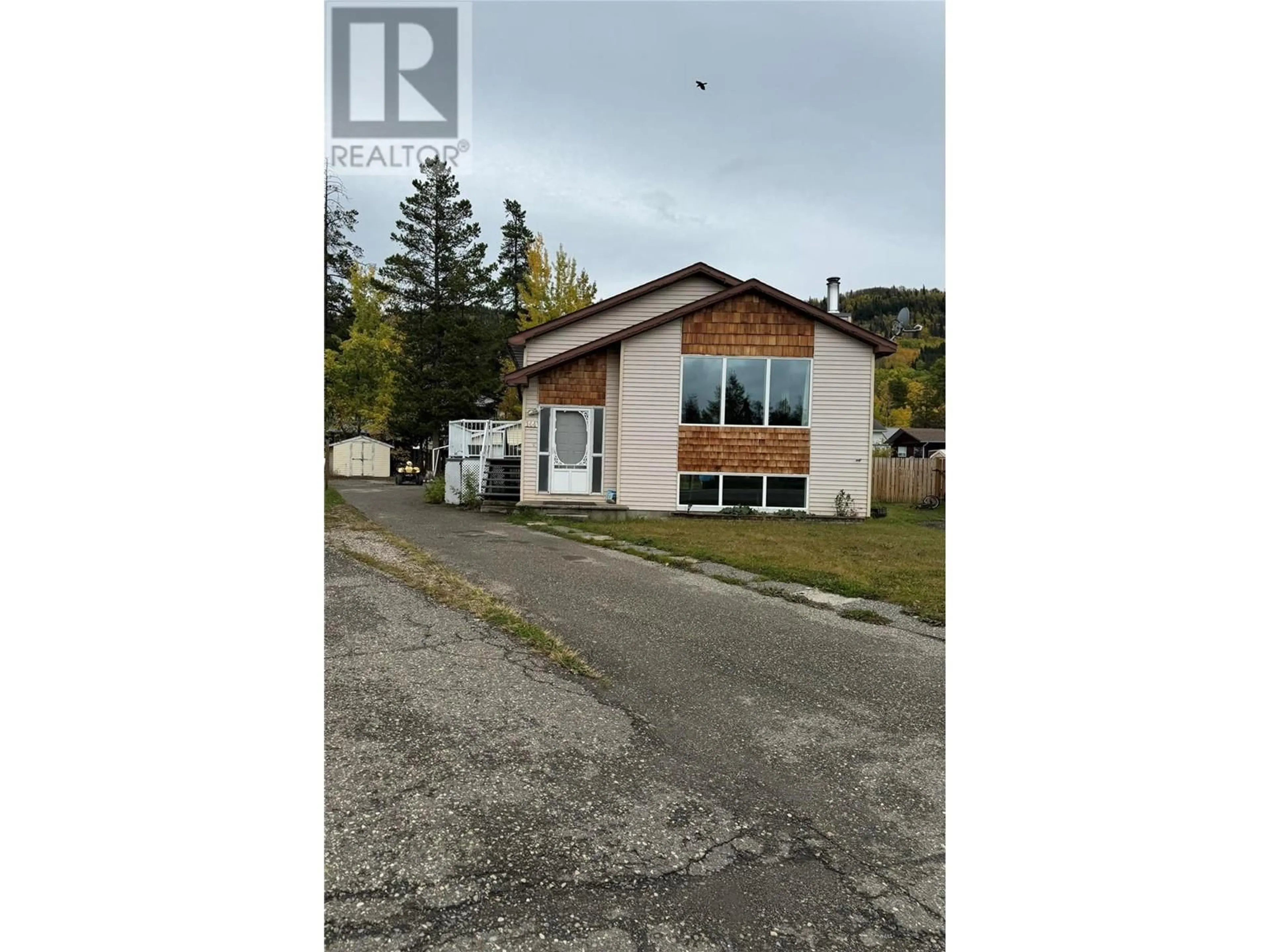 A pic from exterior of the house or condo, the street view for 144 WOLVERINE Avenue, Tumbler Ridge British Columbia V0C2W0