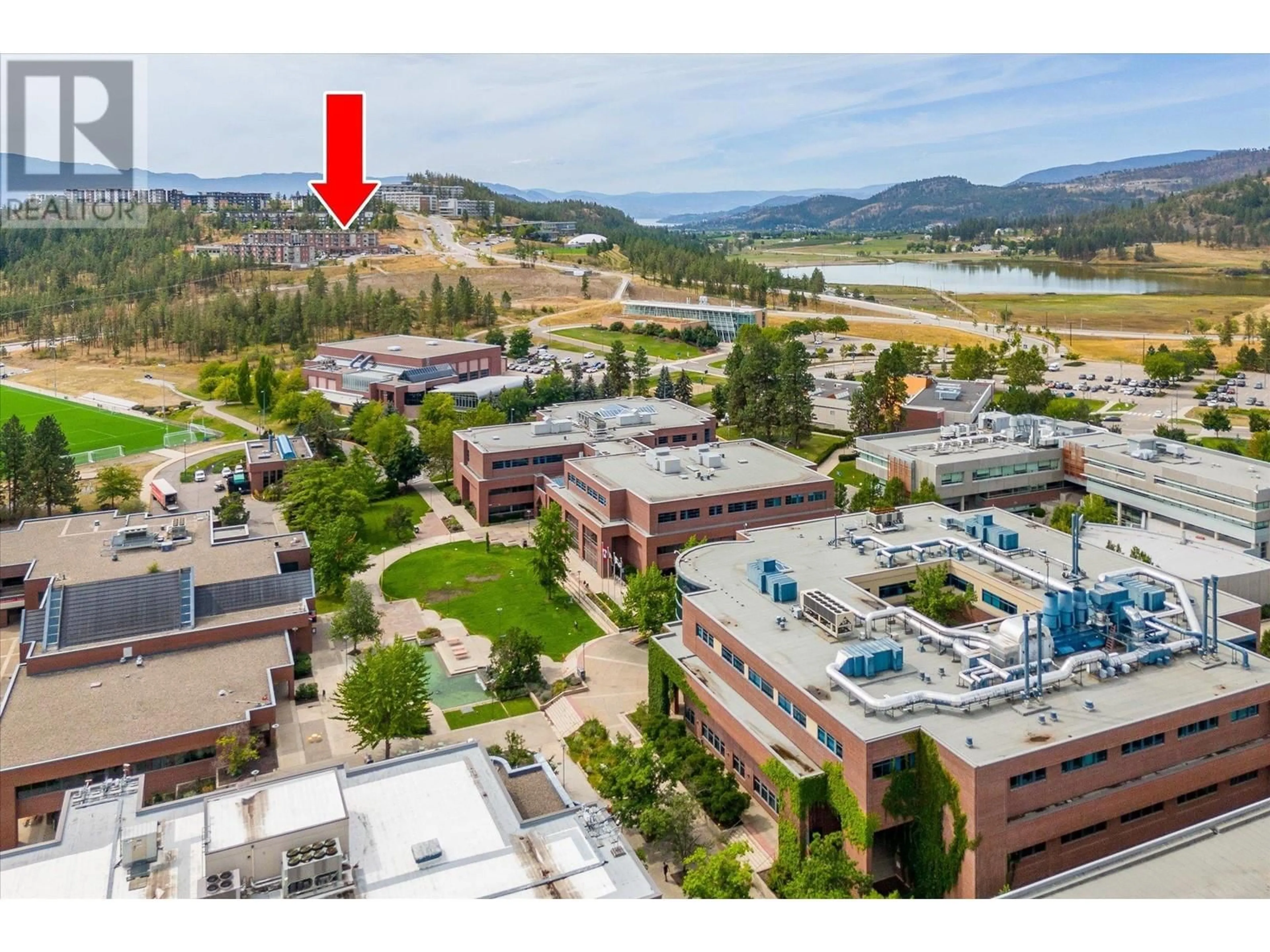 A pic from exterior of the house or condo, the street view for 975 Academy Way Unit# 301, Kelowna British Columbia V1V3C8