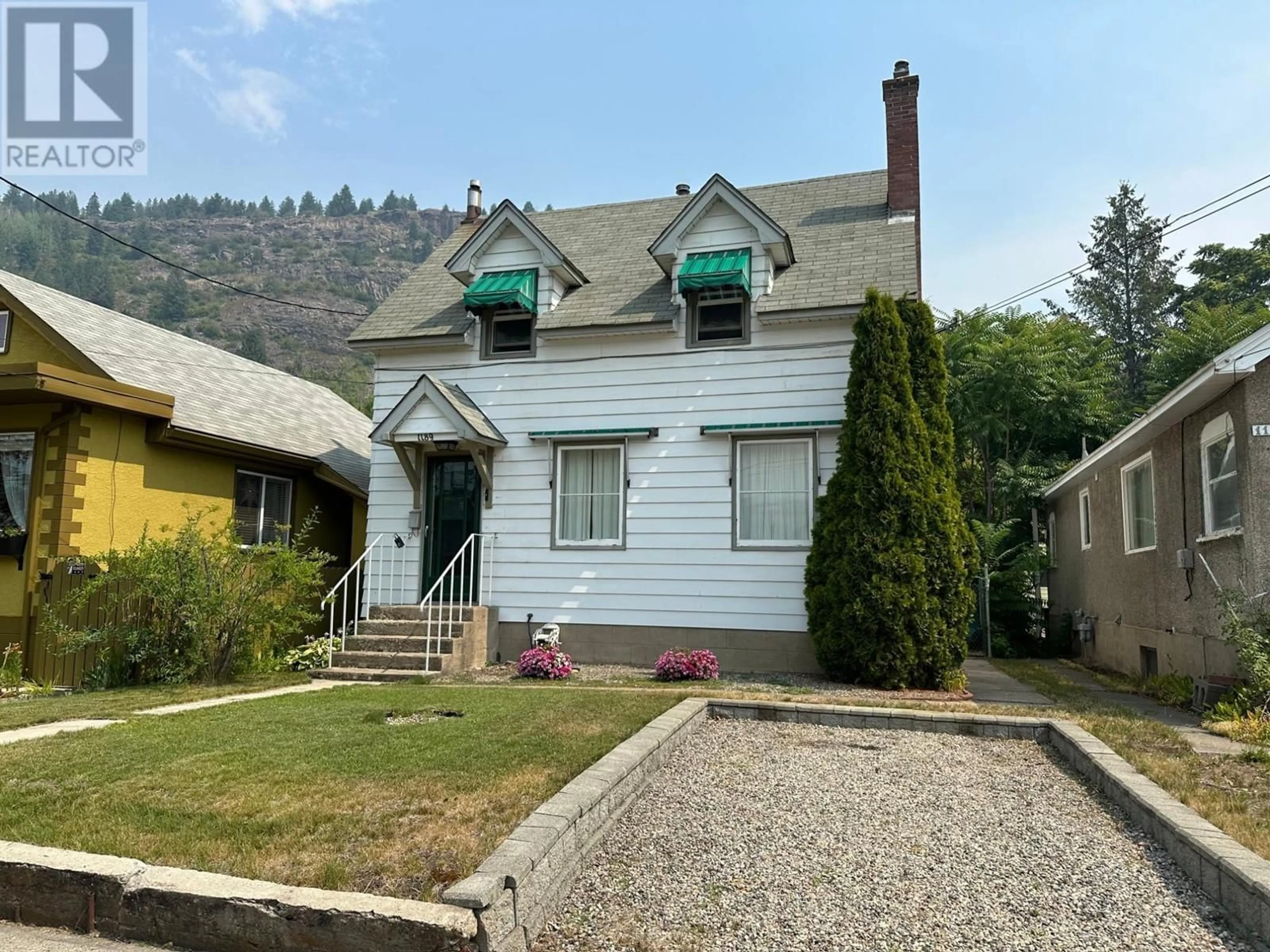 Frontside or backside of a home, cottage for 1189 COLUMBIA Avenue, Trail British Columbia V1R1J1