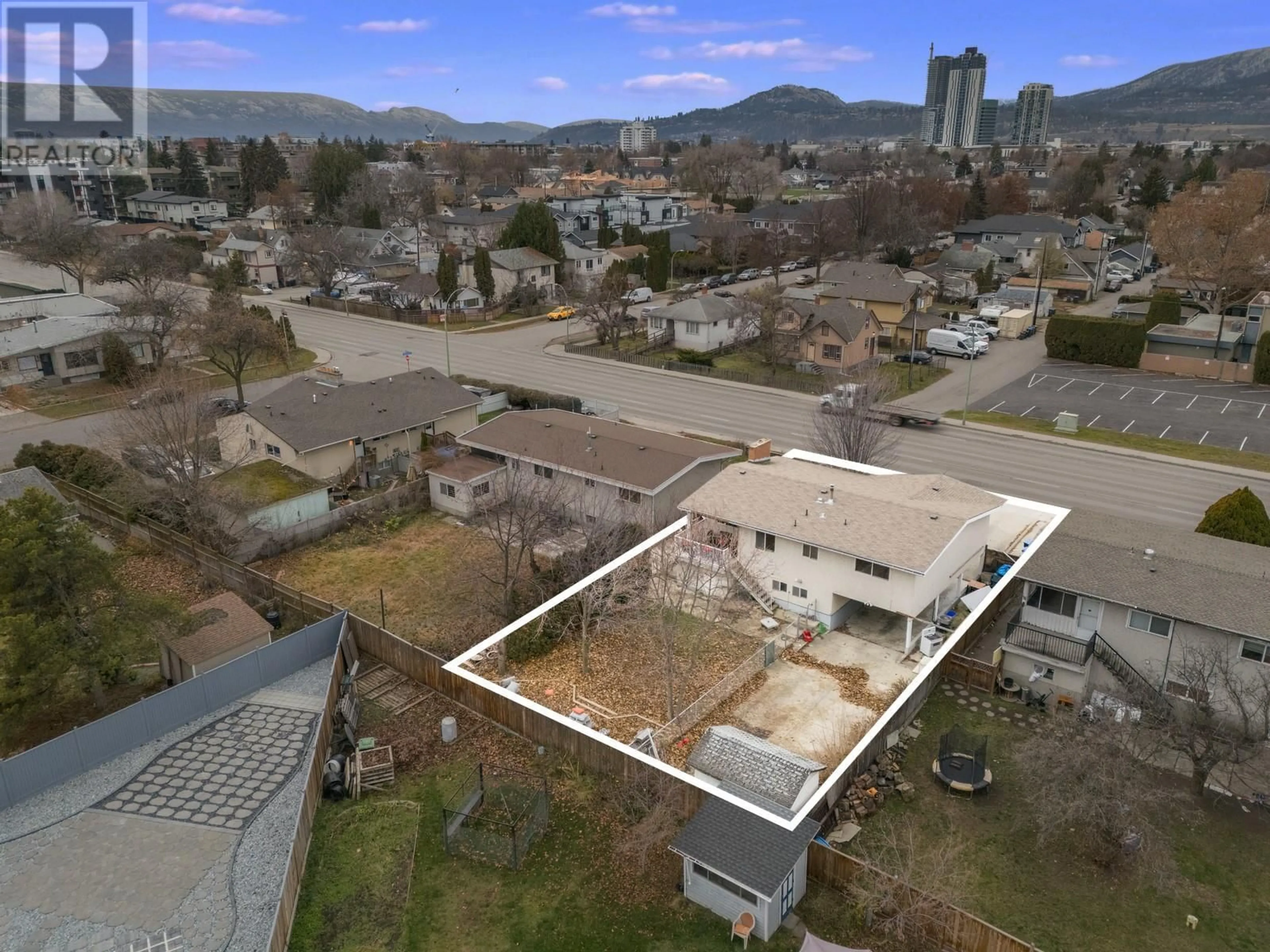 A pic from outside/outdoor area/front of a property/back of a property/a pic from drone, city buildings view from balcony for 1387 Gordon Drive, Kelowna British Columbia V1Y3E9