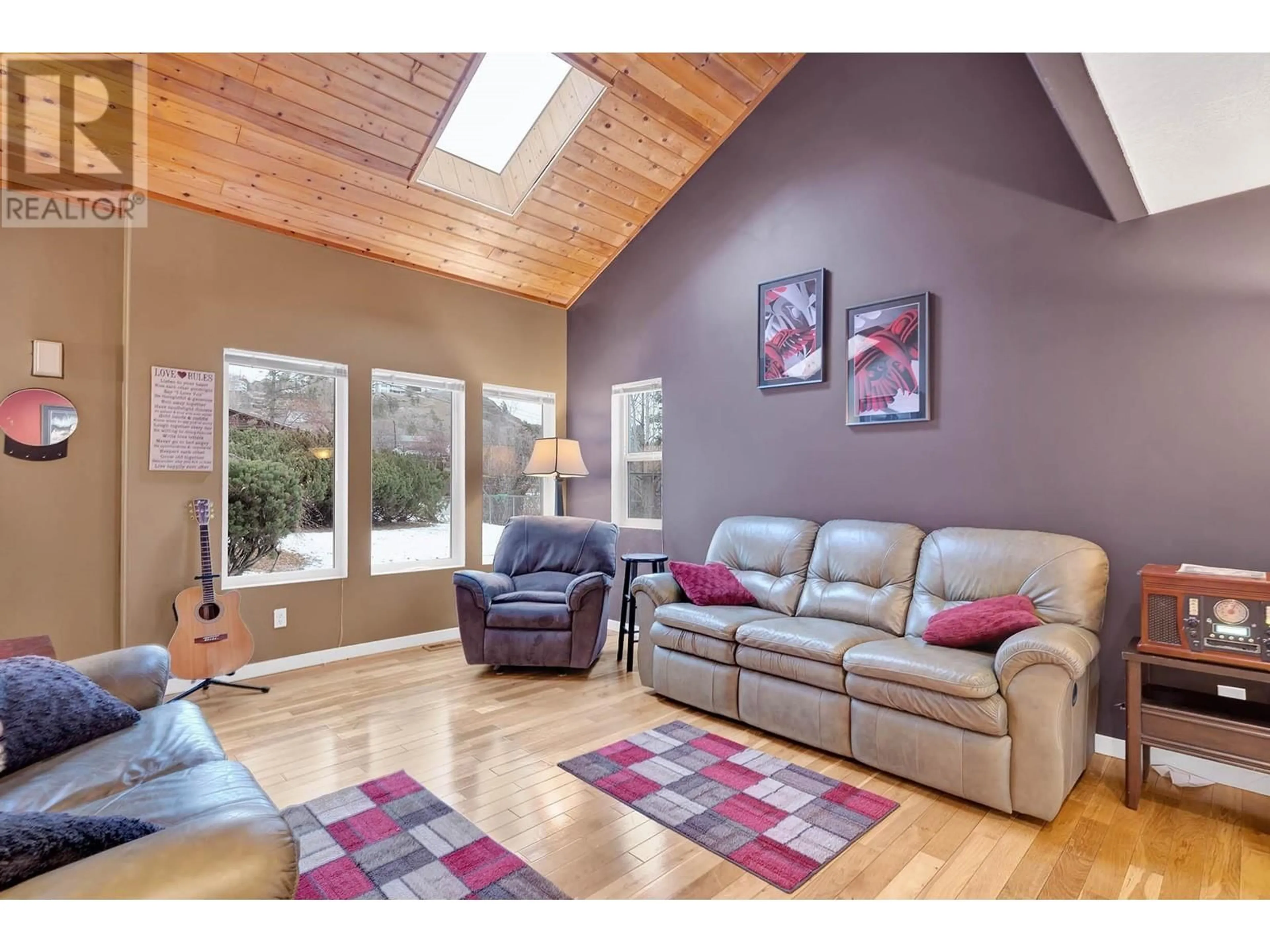 Living room with furniture, wood/laminate floor for 1521 Mt. Dufferin Crescent, Kamloops British Columbia V2E1C3