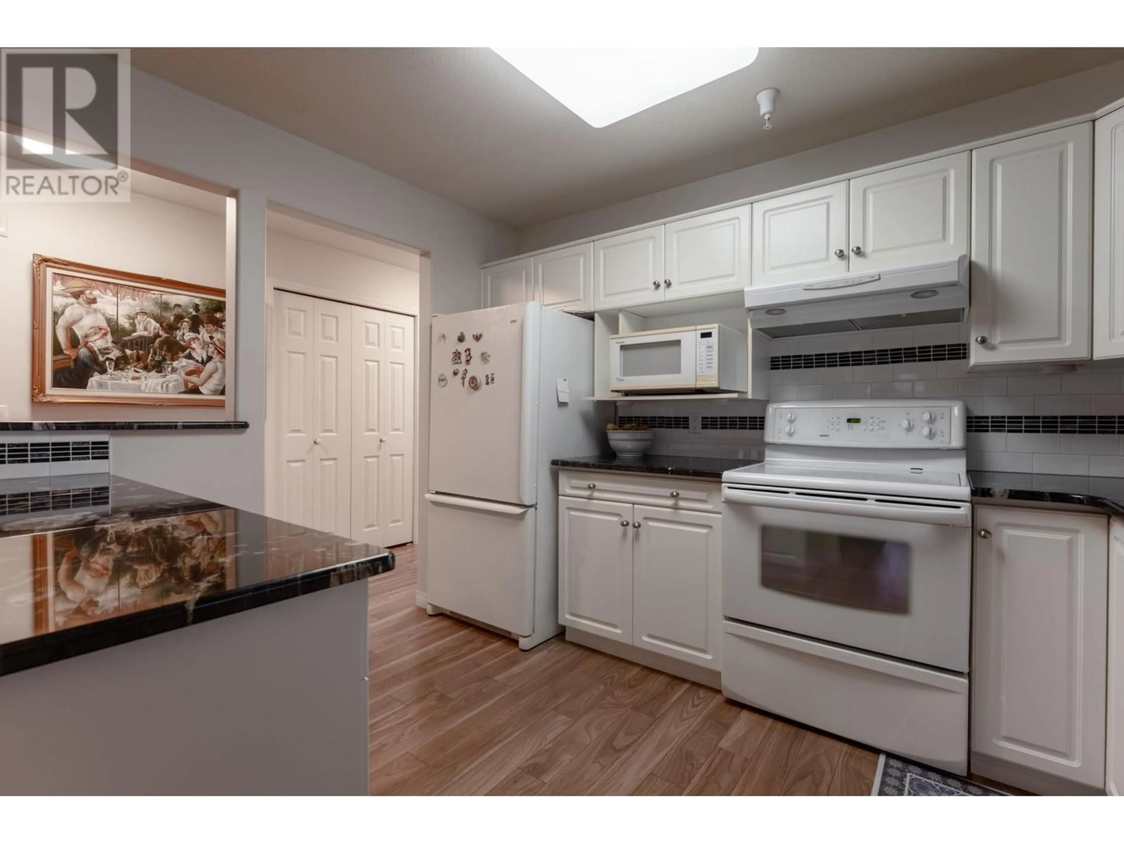 Standard kitchen, wood floors for 2130 Vasile Road Unit# 307, Kelowna British Columbia V1Y6H5