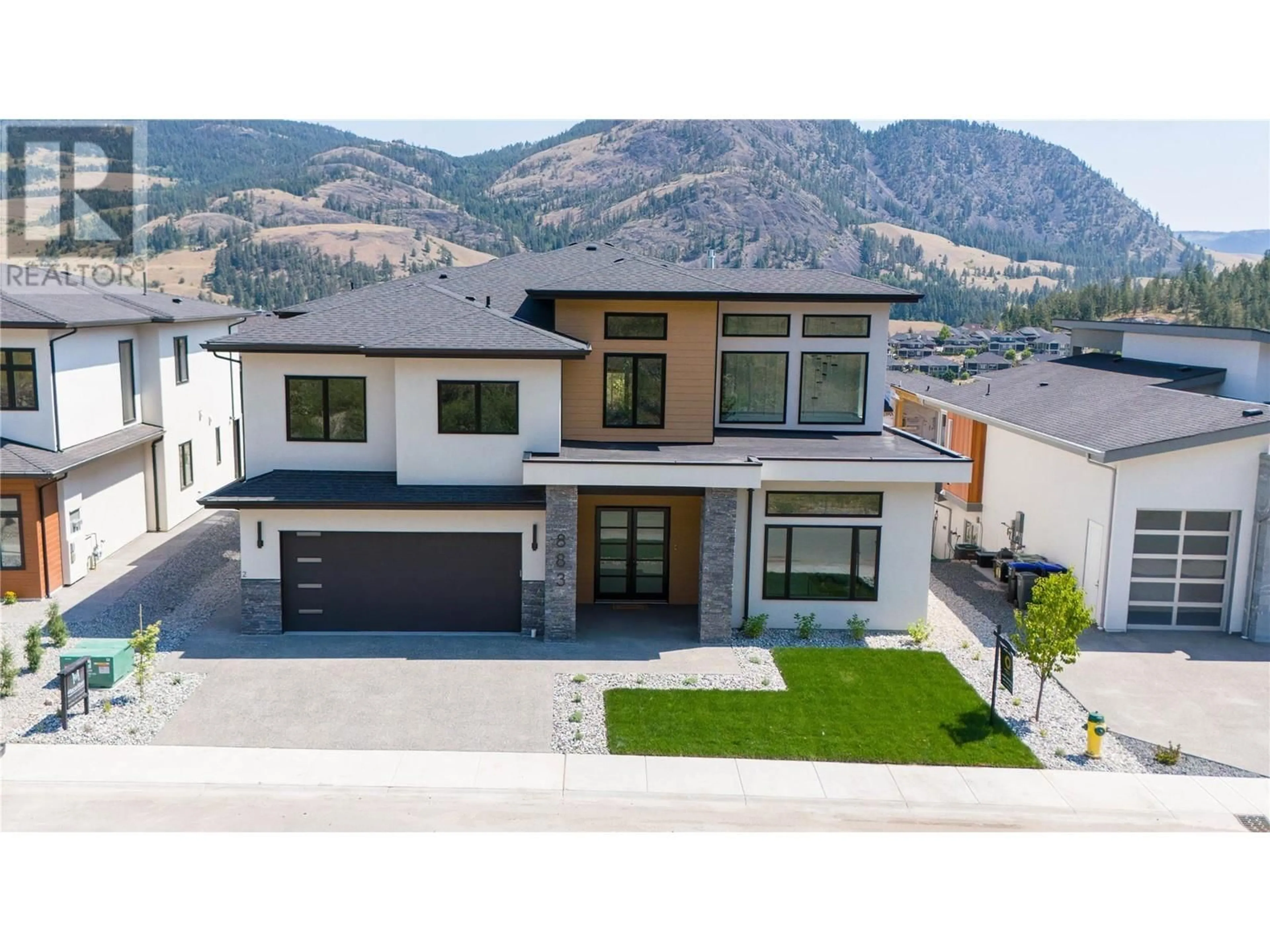 Frontside or backside of a home, mountain for 883 Loseth Drive, Kelowna British Columbia V1P0A1