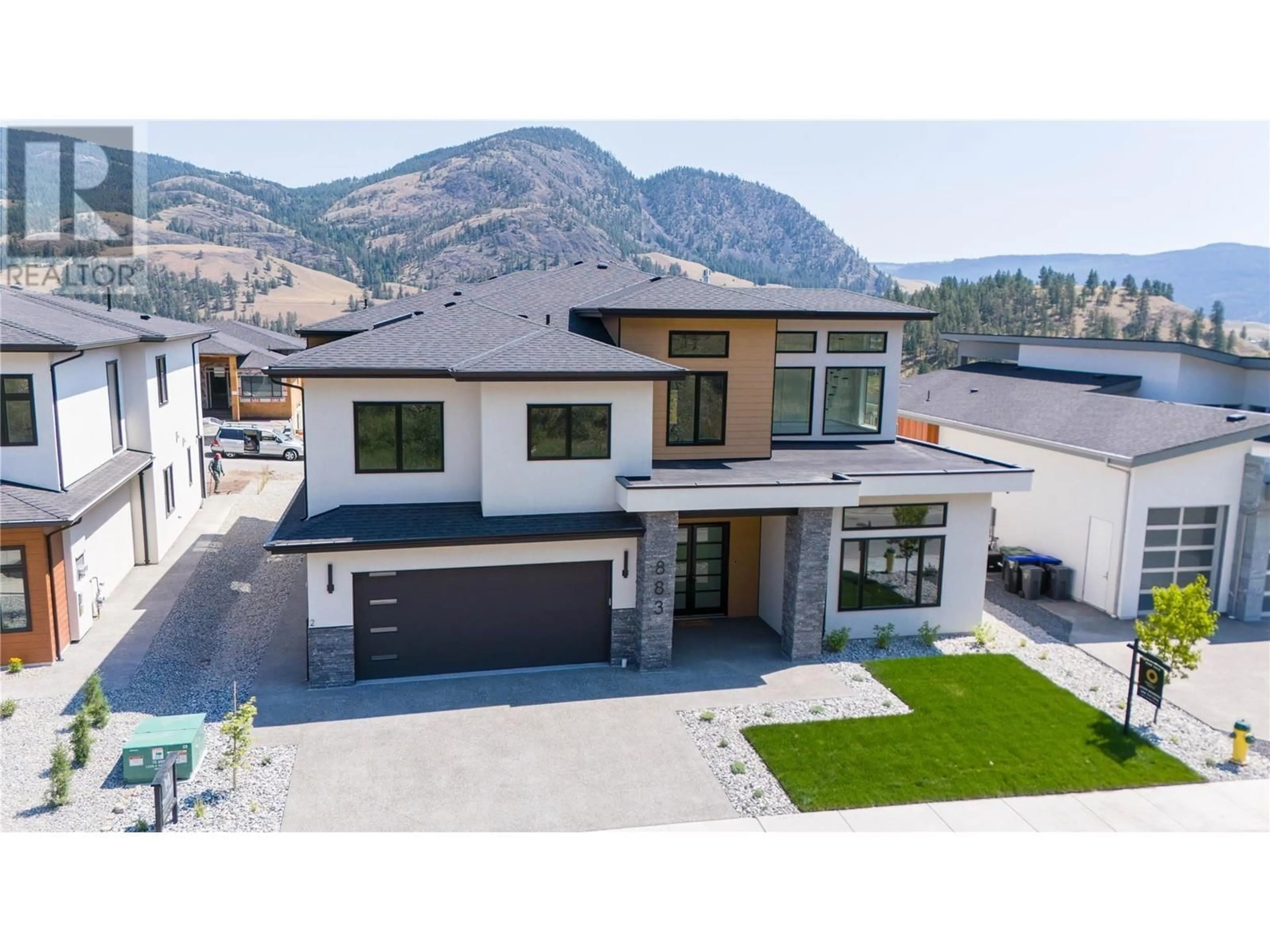 Frontside or backside of a home, mountain for 883 Loseth Drive, Kelowna British Columbia V1P0A1