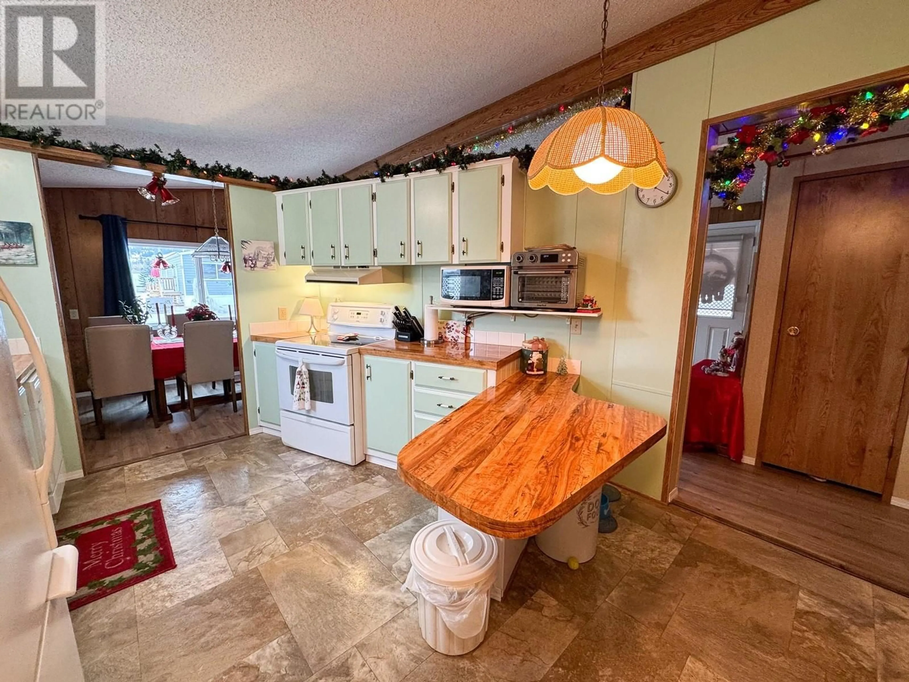 Kitchen, wood floors, cottage for 2776 CLAPPERTON Avenue Unit# 34, Merritt British Columbia V1K1G5