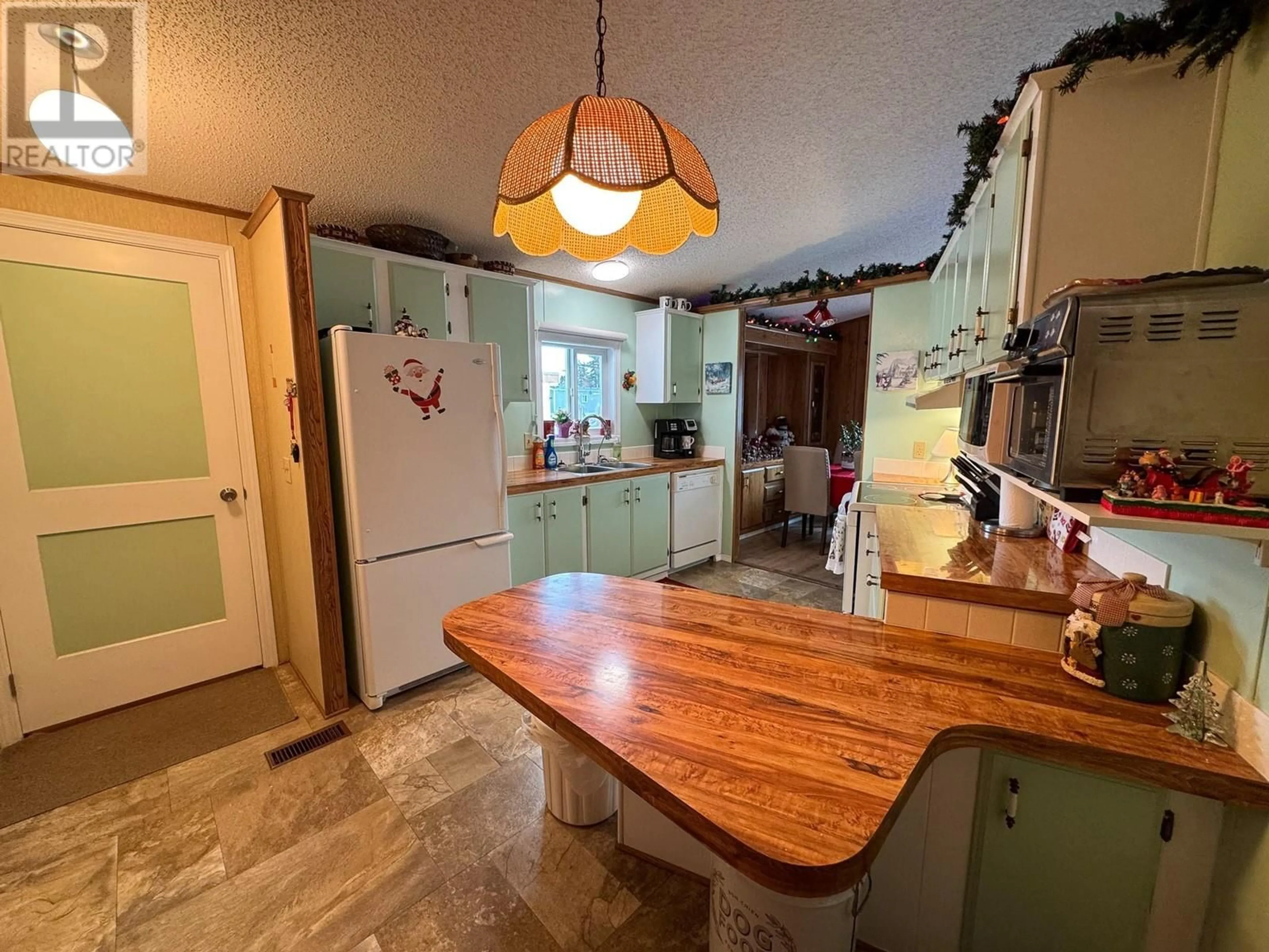 Kitchen, wood floors, cottage for 2776 CLAPPERTON Avenue Unit# 34, Merritt British Columbia V1K1G5