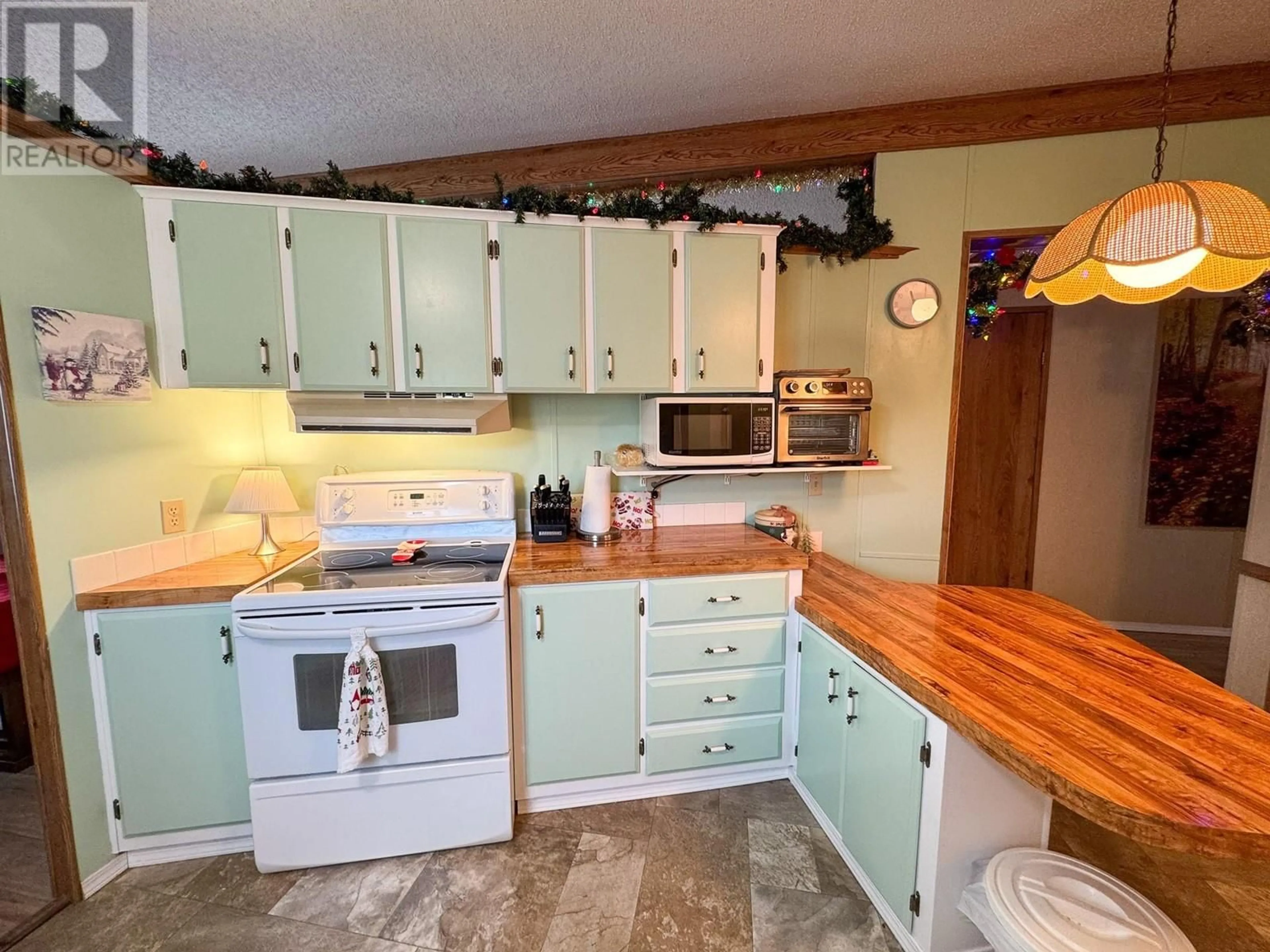 Kitchen, wood floors, cottage for 2776 CLAPPERTON Avenue Unit# 34, Merritt British Columbia V1K1G5