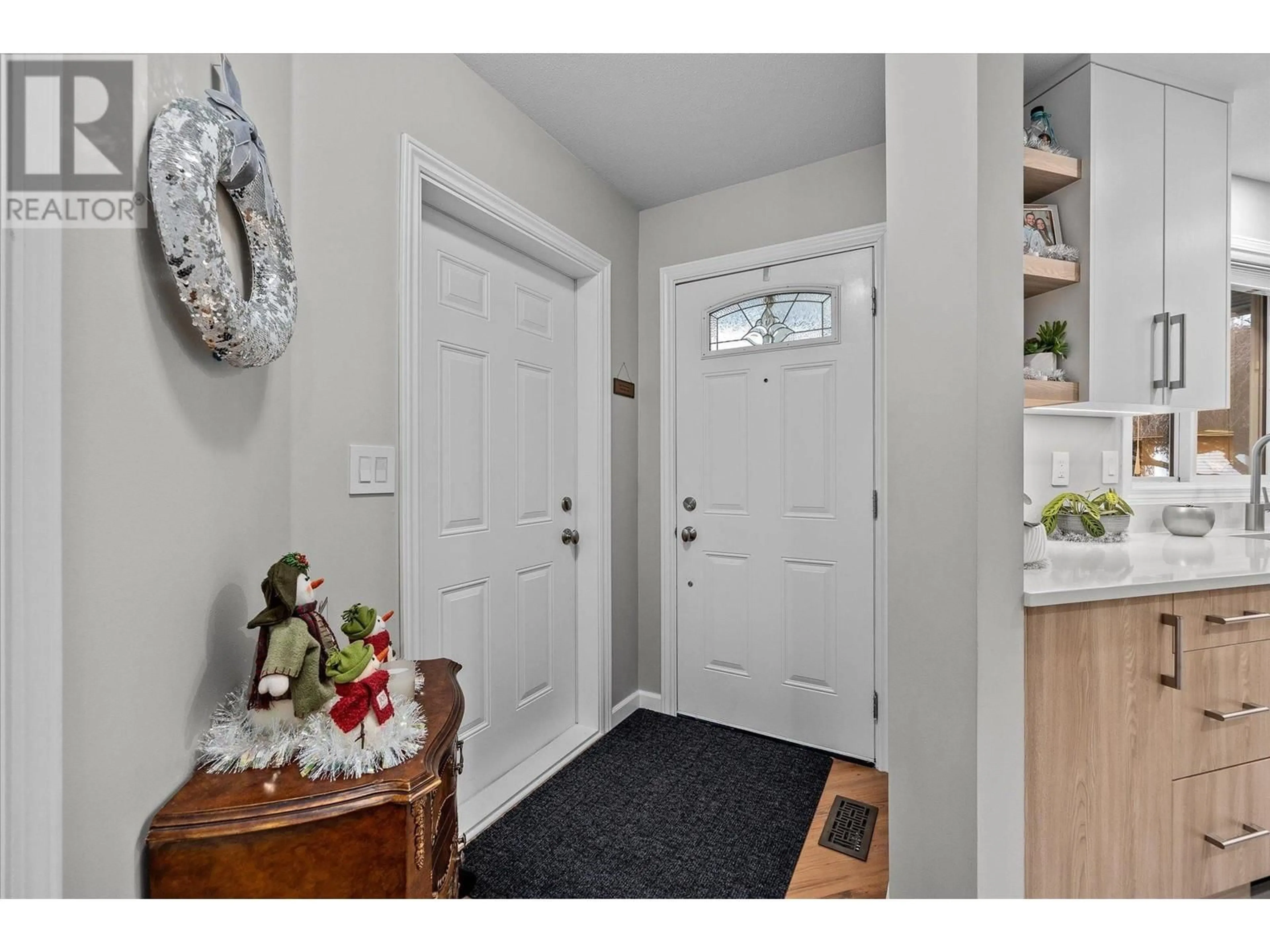 Indoor entryway, wood floors for 1120 Guisachan Road Unit# 28, Kelowna British Columbia V1Y9R5