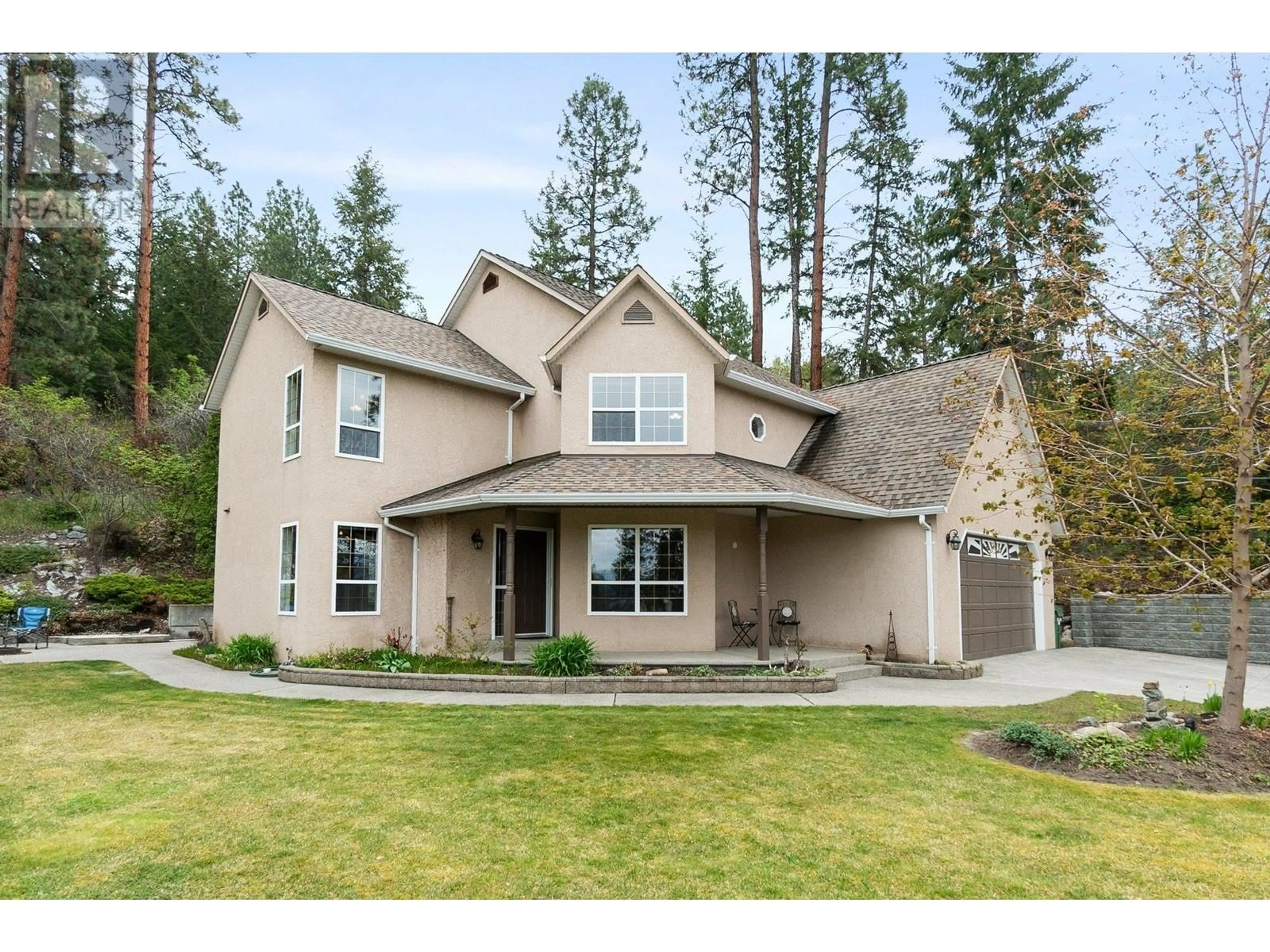 Home with vinyl exterior material, street for 3281 JUNIPER DRIVE, Naramata British Columbia V0H1N1