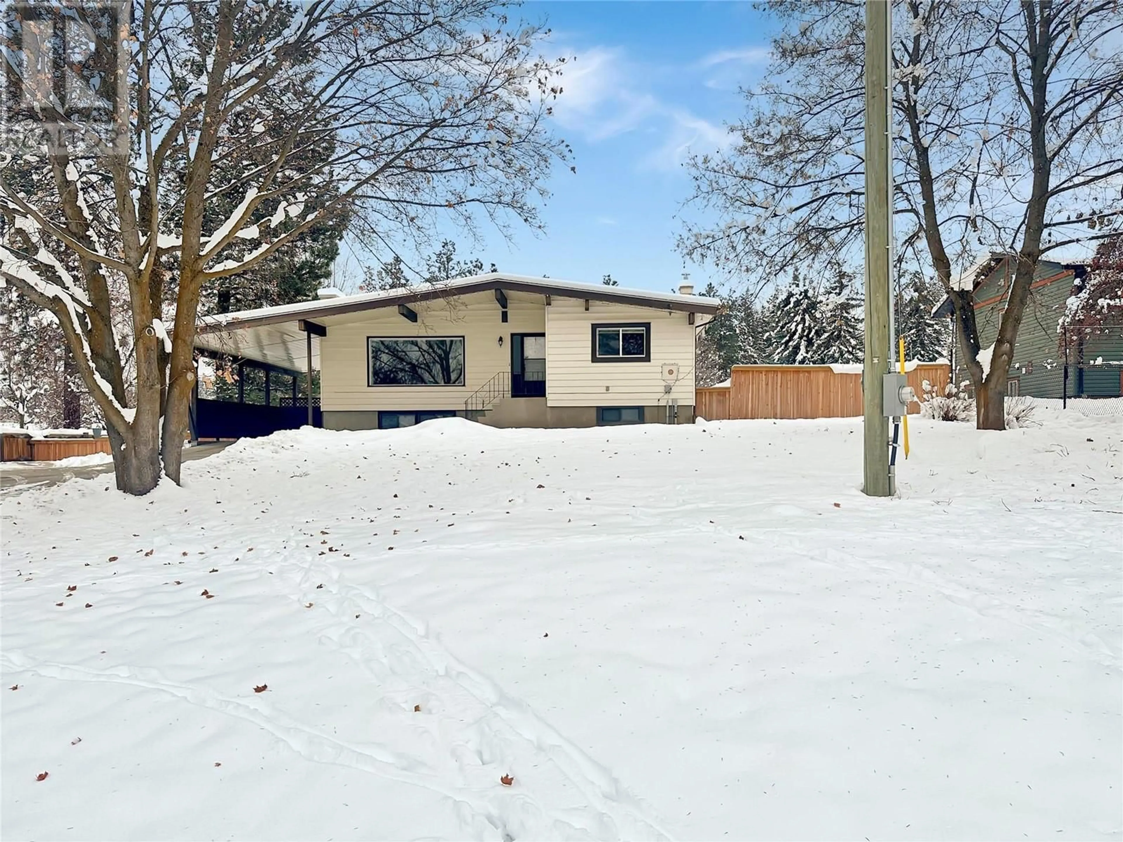 A pic from exterior of the house or condo, the fenced backyard for 310 27 A Avenue S, Cranbrook British Columbia V1C3J7