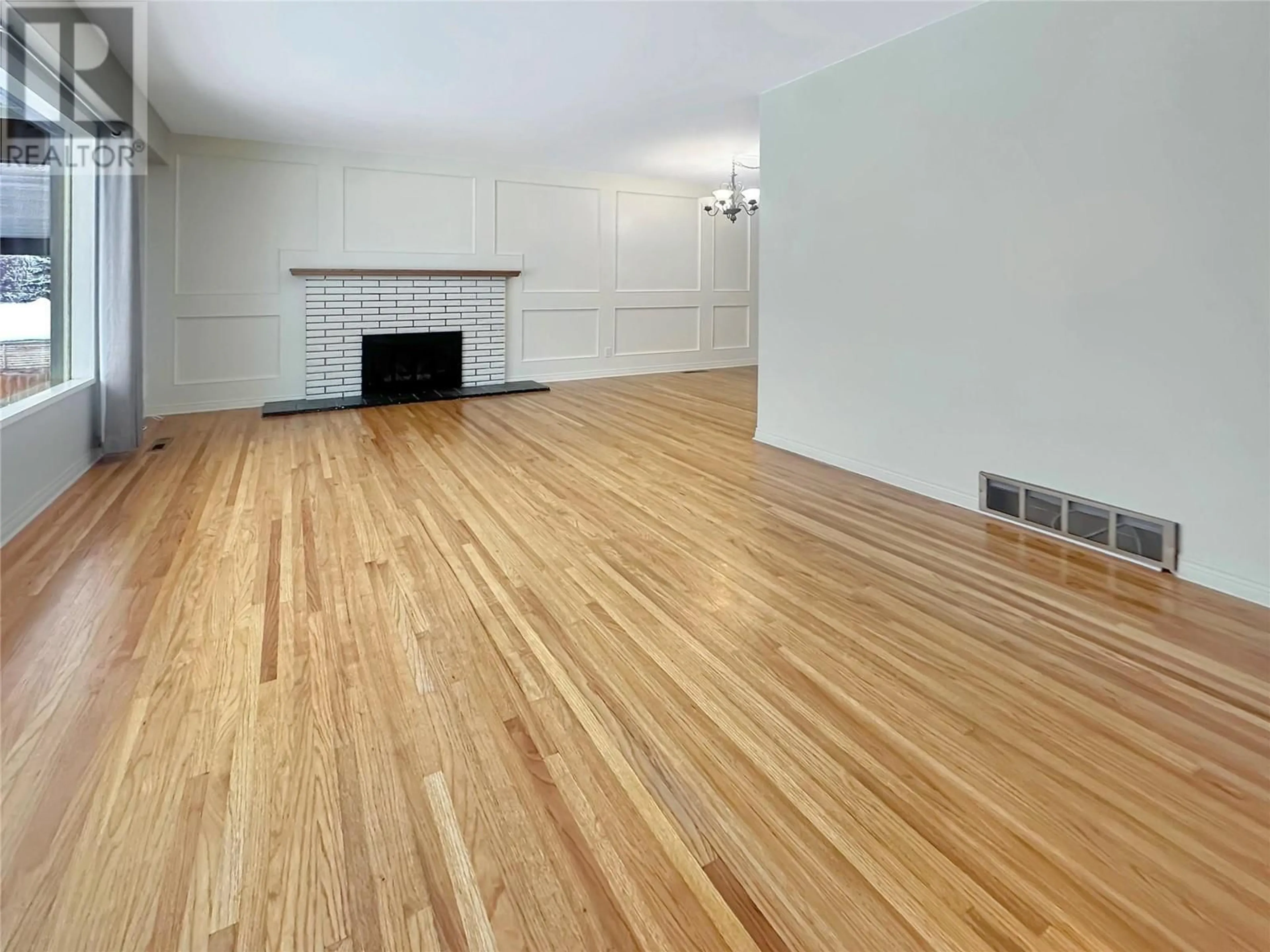 A pic of a room, wood floors for 310 27 A Avenue S, Cranbrook British Columbia V1C3J7