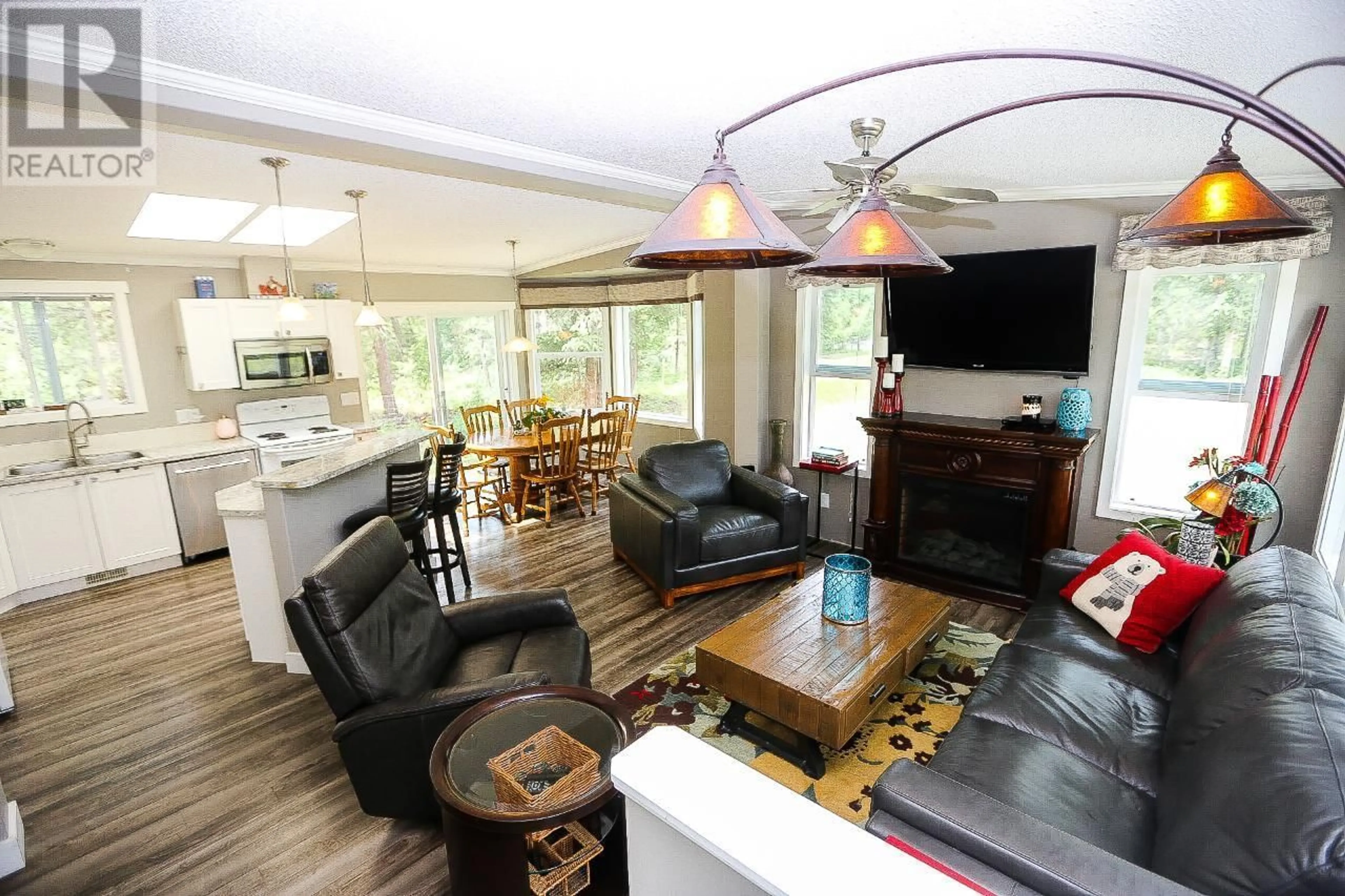 Living room, wood floors for 4861 BIRCH Lane, Barriere British Columbia V0E1E0