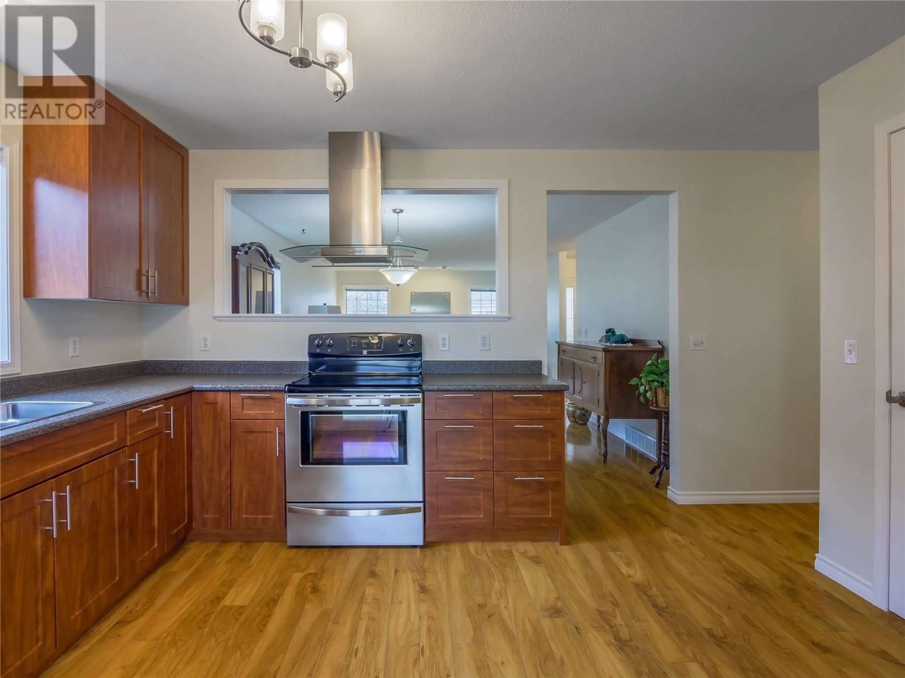 Open concept kitchen, wood/laminate floor for 3333 South Main Street Unit# 138, Penticton British Columbia V2A8J8