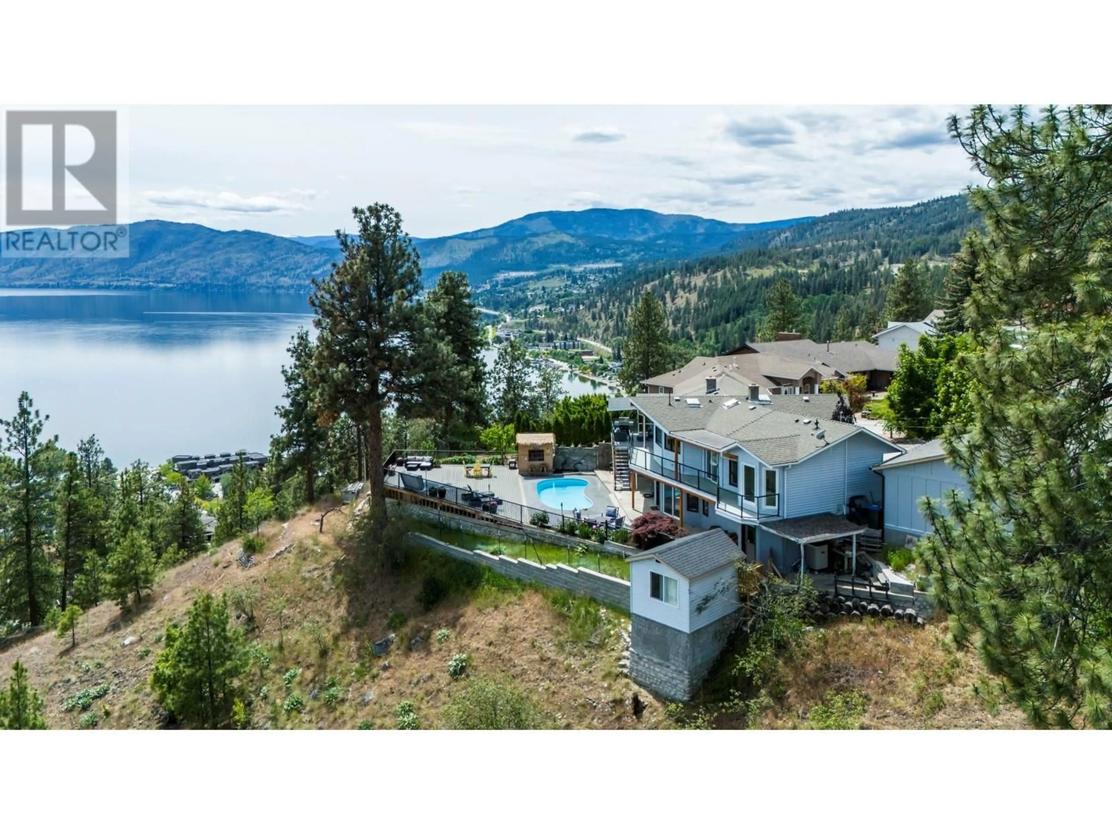 A pic from outside/outdoor area/front of a property/back of a property/a pic from drone, water/lake/river/ocean view for 4181 6 Avenue, Peachland British Columbia V0H1X5