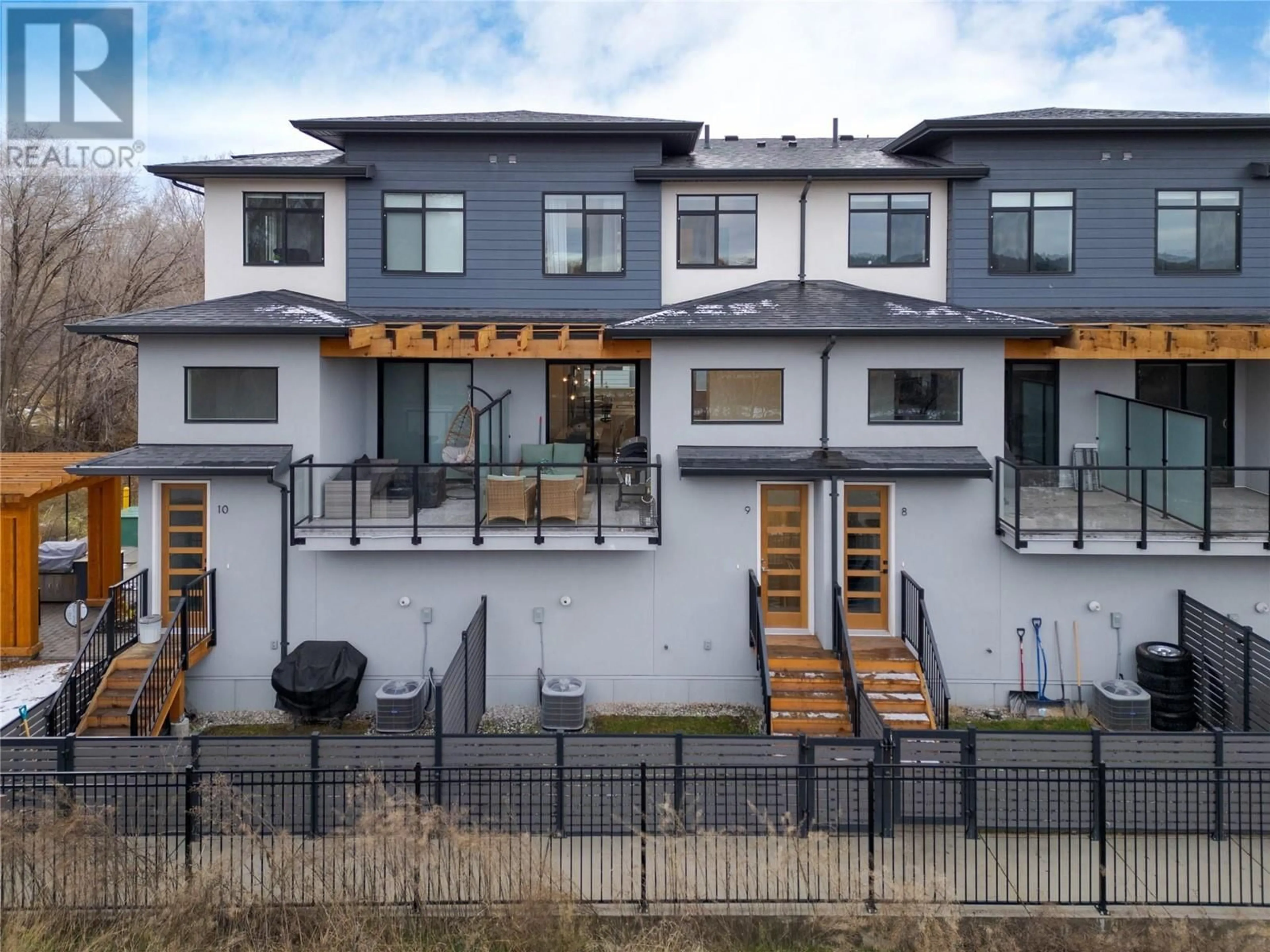 Home with brick exterior material, street for 1225 Findlay Road Unit# 9, Kelowna British Columbia V1X5B1