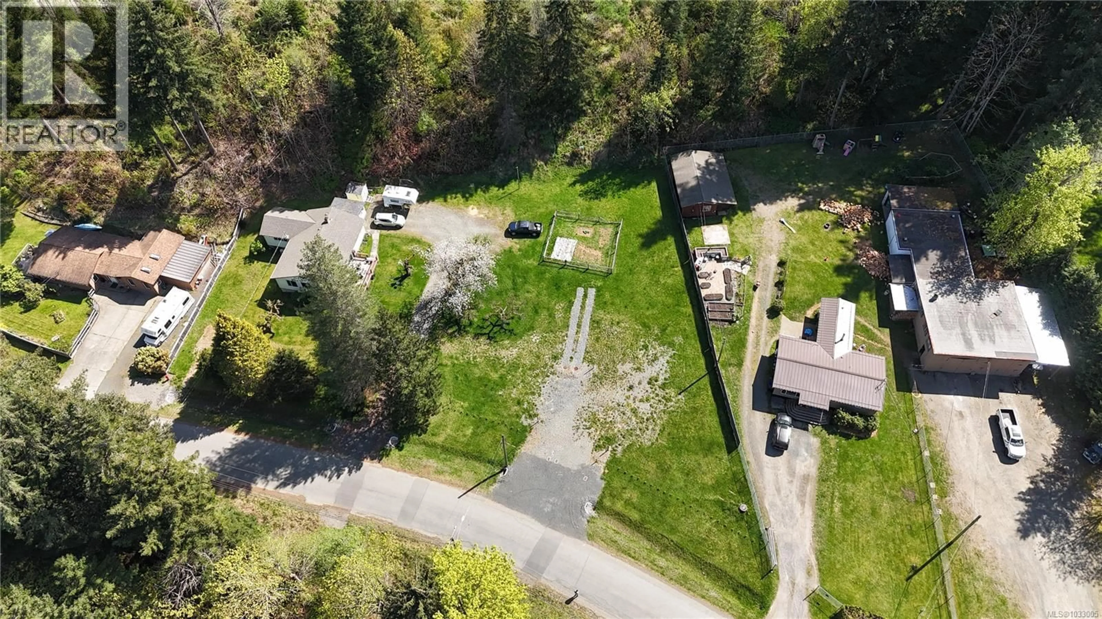 A pic from outside/outdoor area/front of a property/back of a property/a pic from drone, street for B - 1655 NURSERY ROAD, Campbell River British Columbia V9W4V4