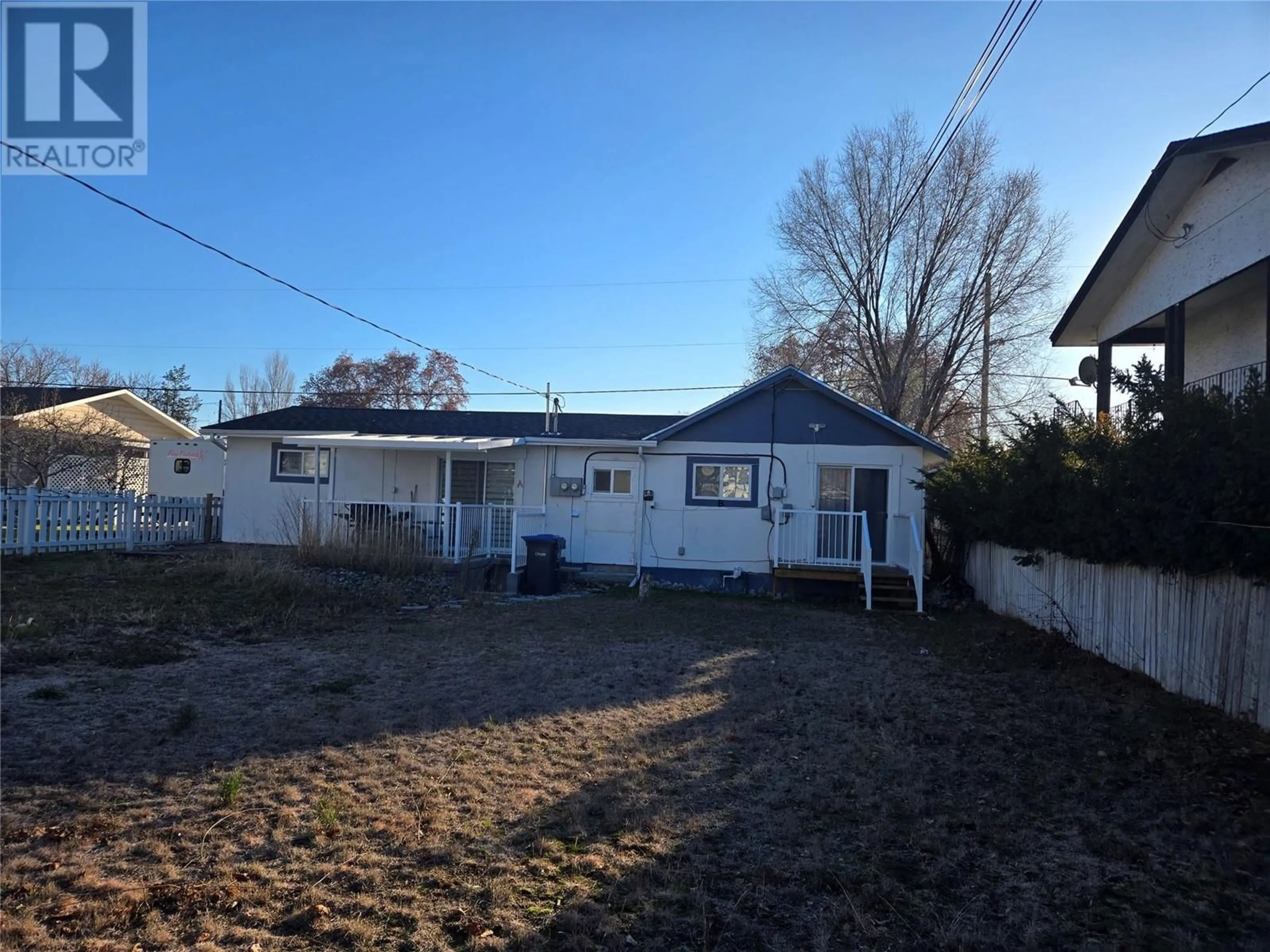 A pic from outside/outdoor area/front of a property/back of a property/a pic from drone, street for 6215 MAPLE DRIVE, Osoyoos British Columbia V0H1V4