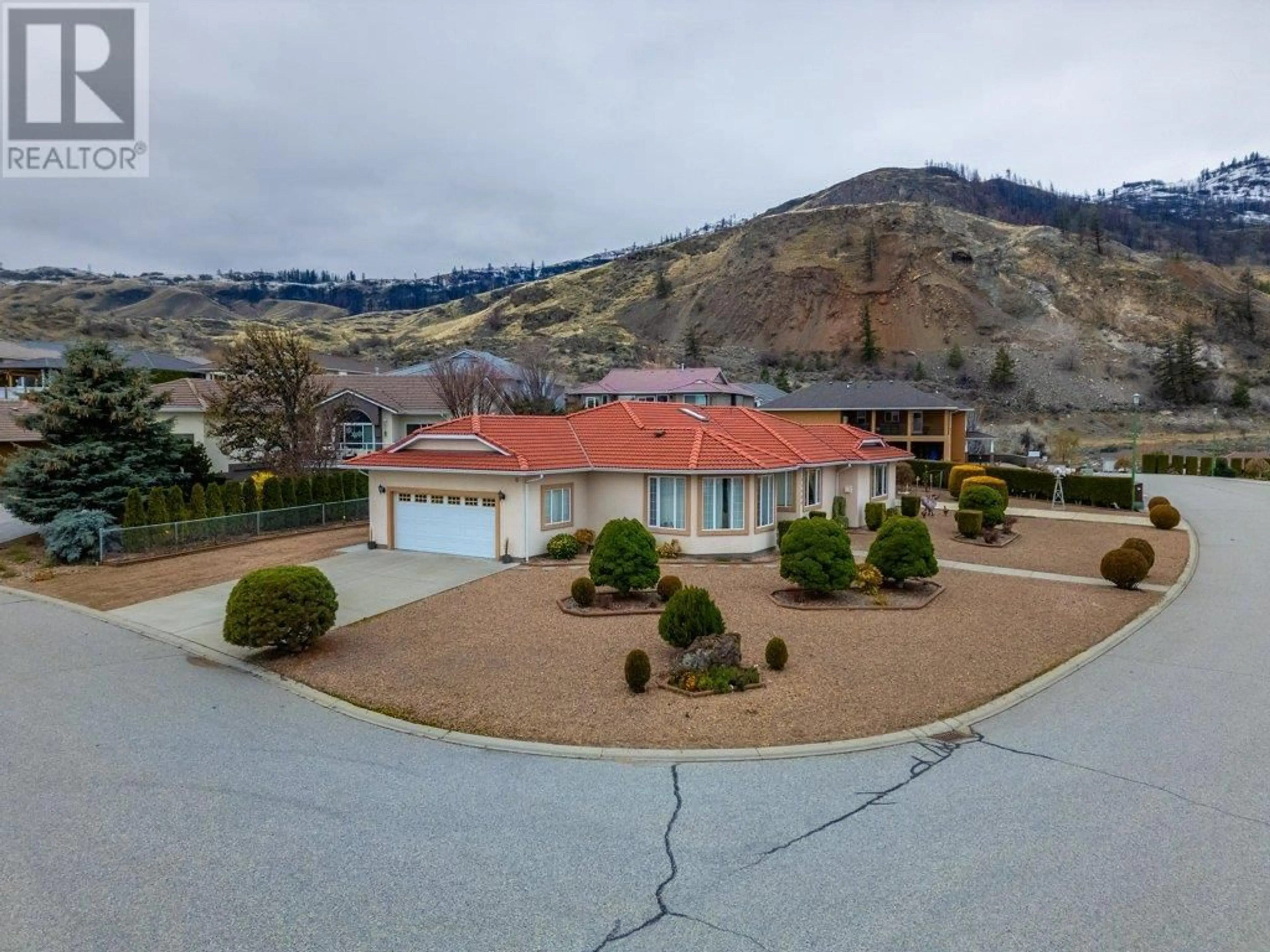 A pic from outside/outdoor area/front of a property/back of a property/a pic from drone, mountain view for 11900 Olympic View Drive, Osoyoos British Columbia V0H1V4