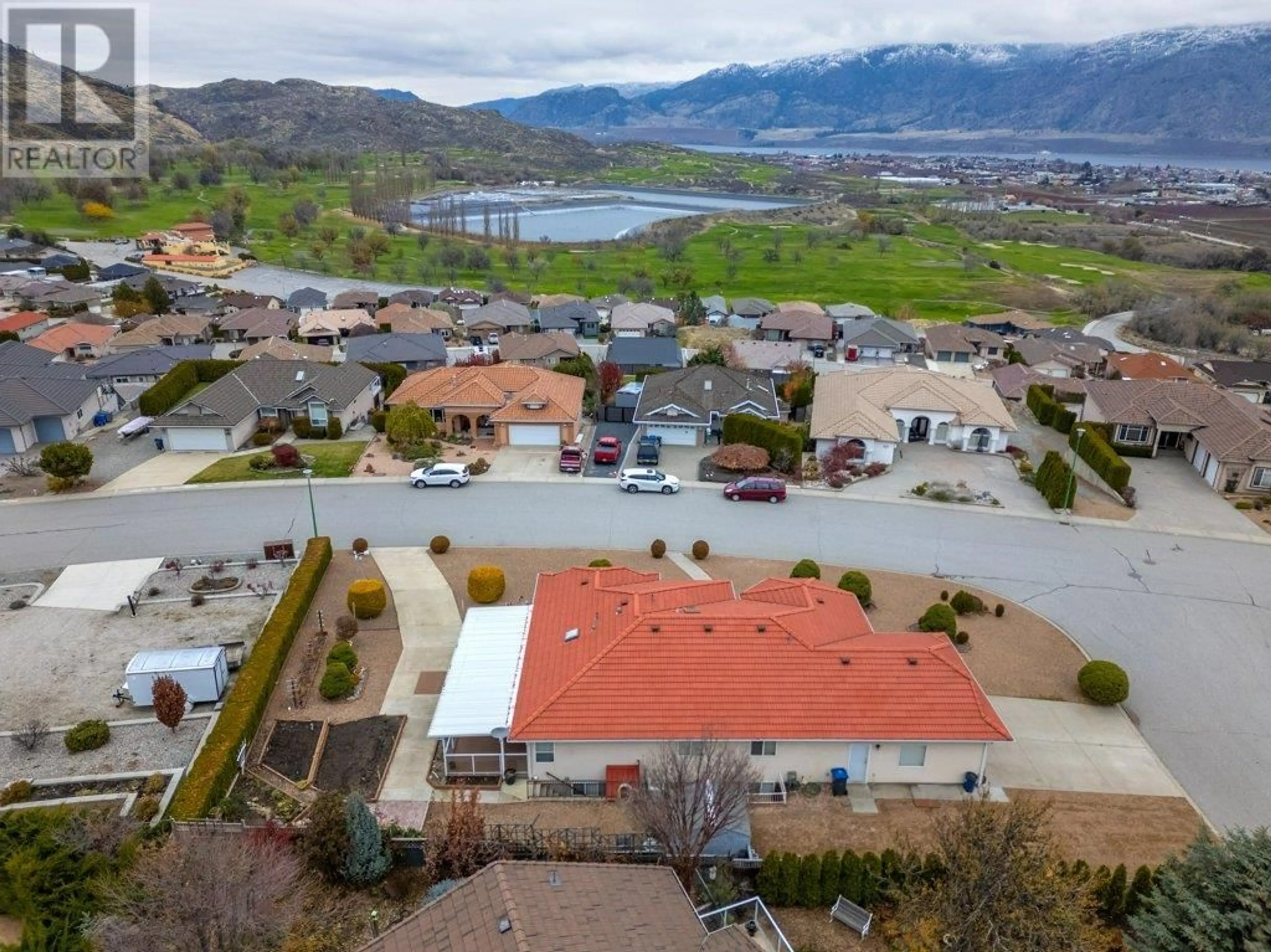 A pic from outside/outdoor area/front of a property/back of a property/a pic from drone, mountain view for 11900 Olympic View Drive, Osoyoos British Columbia V0H1V4