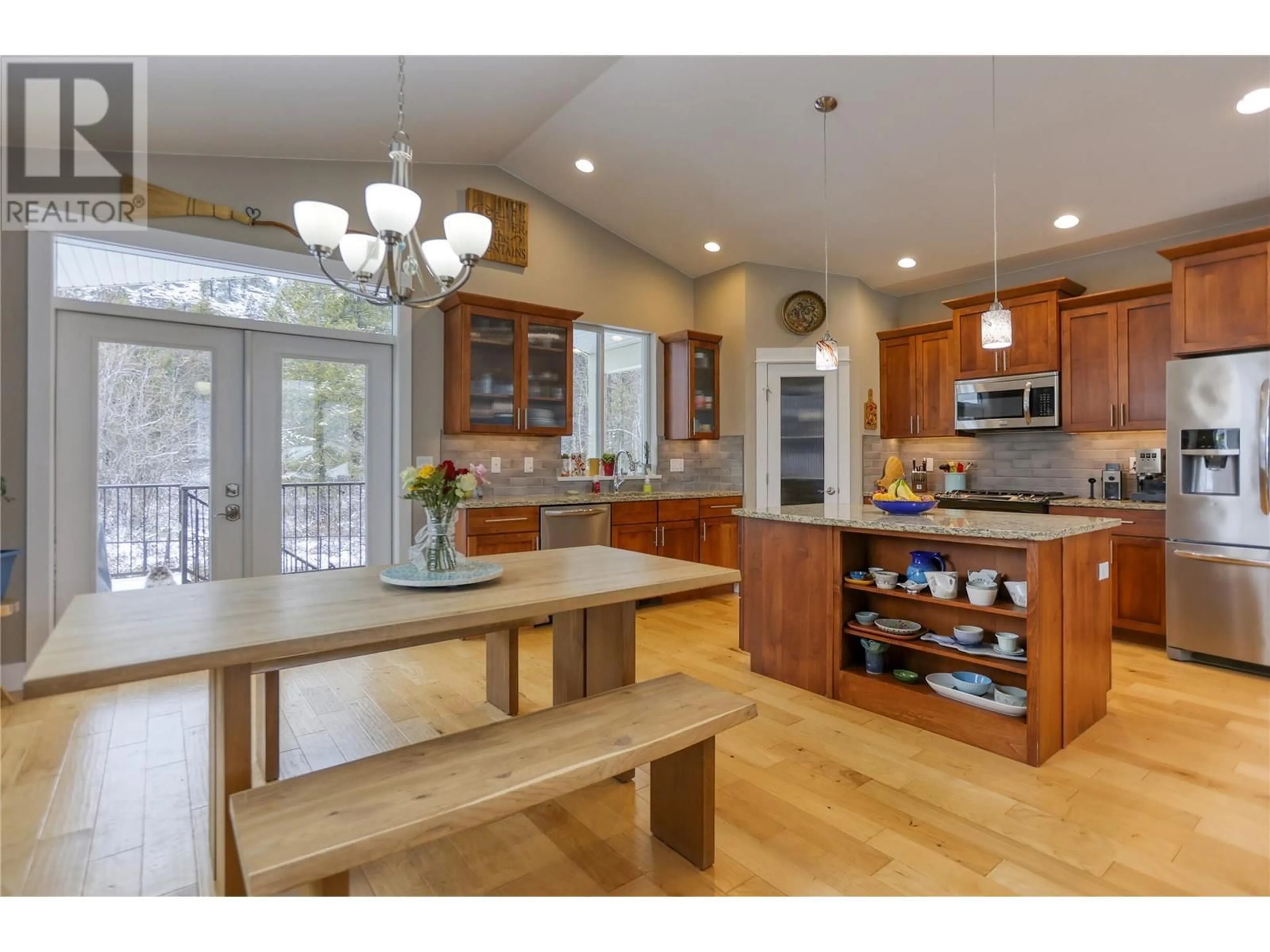 Open concept kitchen, wood/laminate floor for 4104 16th Avenue, Castlegar British Columbia V1N4X7