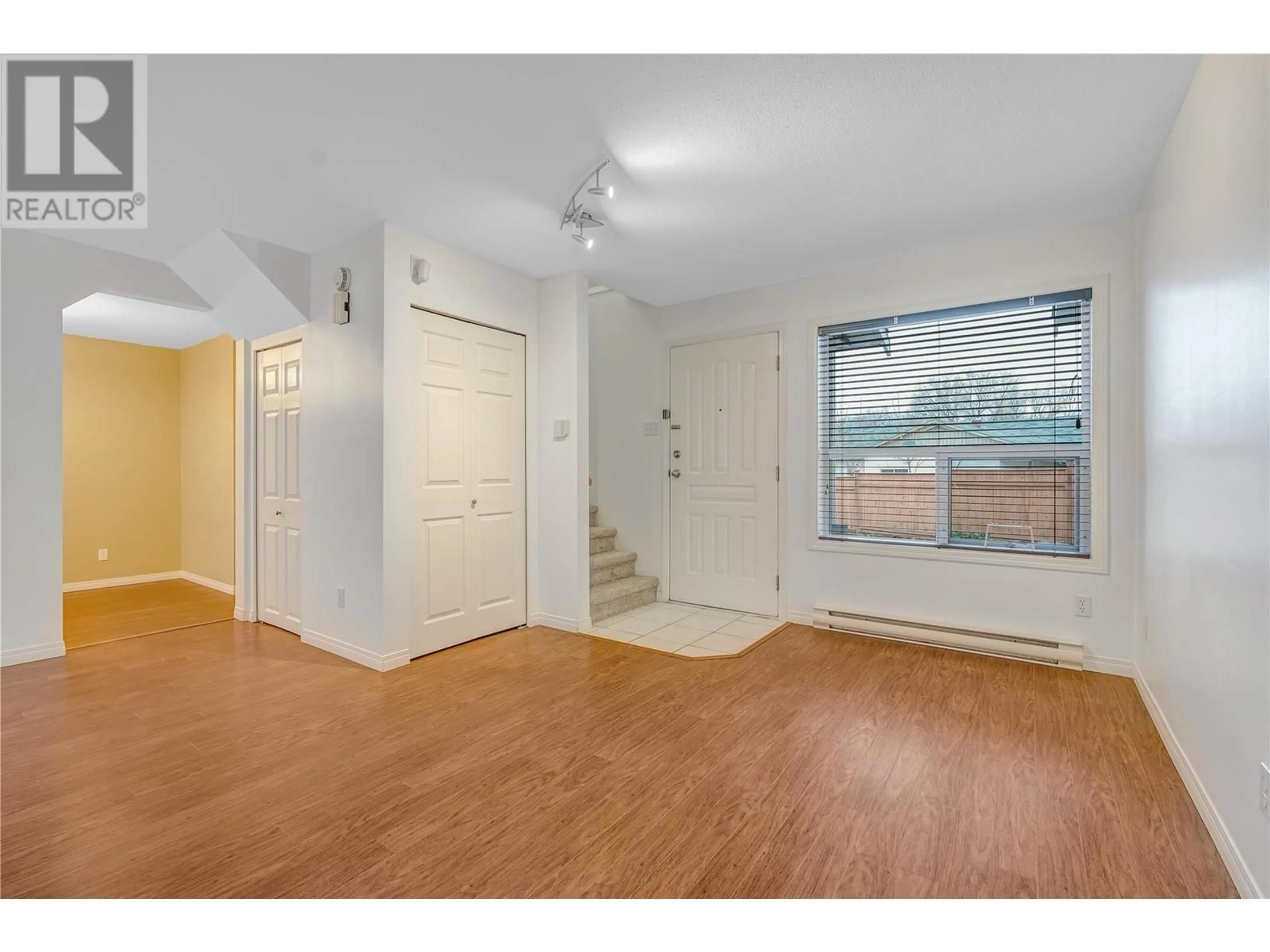 A pic of a room, wood floors for 1006 King Street Unit# 107, Penticton British Columbia V2A4S6