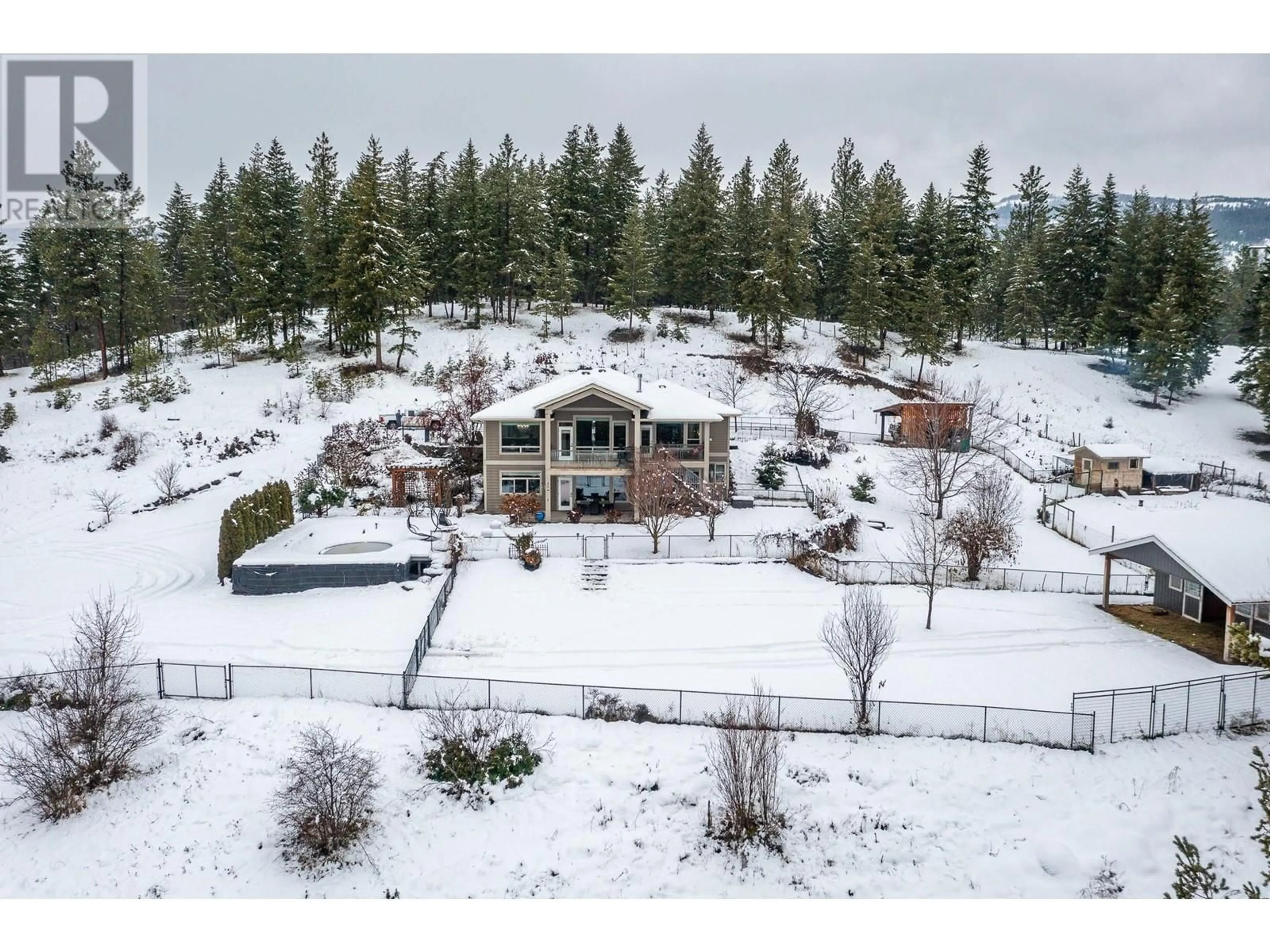 A pic from outside/outdoor area/front of a property/back of a property/a pic from drone, mountain view for 3888 Salmon River Road, Falkland British Columbia V0E1W0