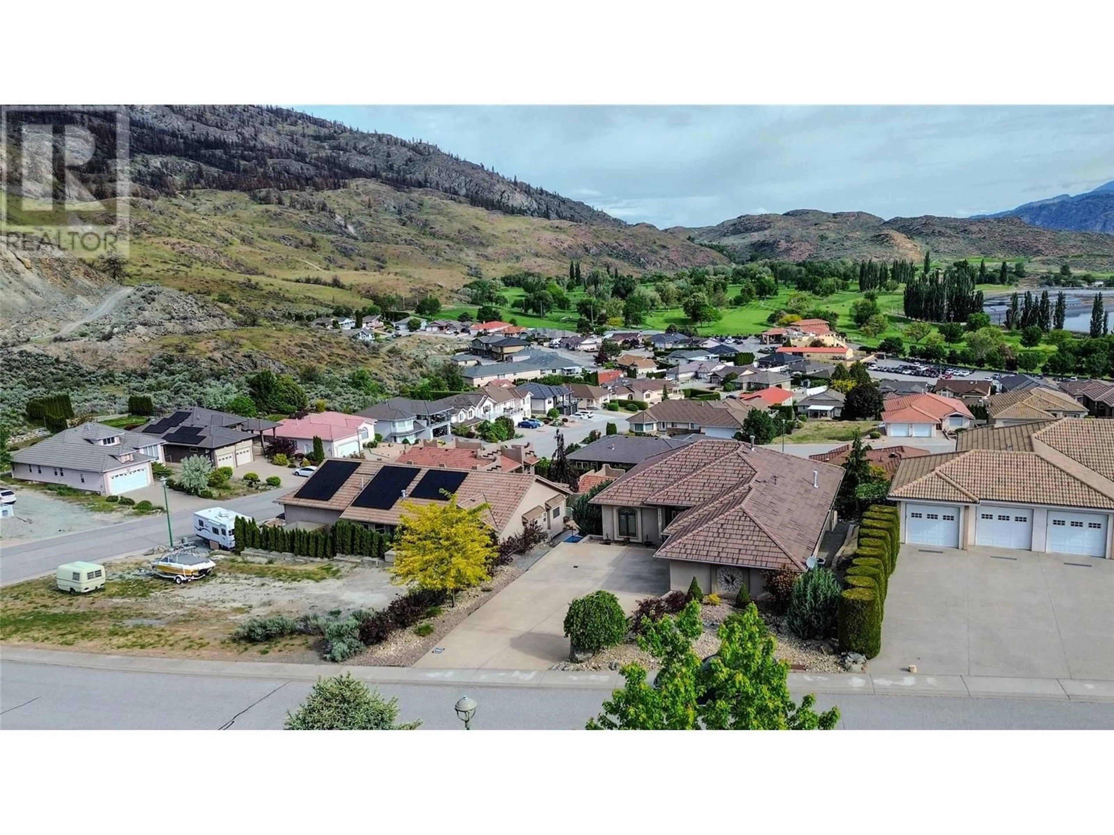 A pic from outside/outdoor area/front of a property/back of a property/a pic from drone, mountain view for 11911 OLYMPIC VIEW Drive, Osoyoos British Columbia V0H1V4