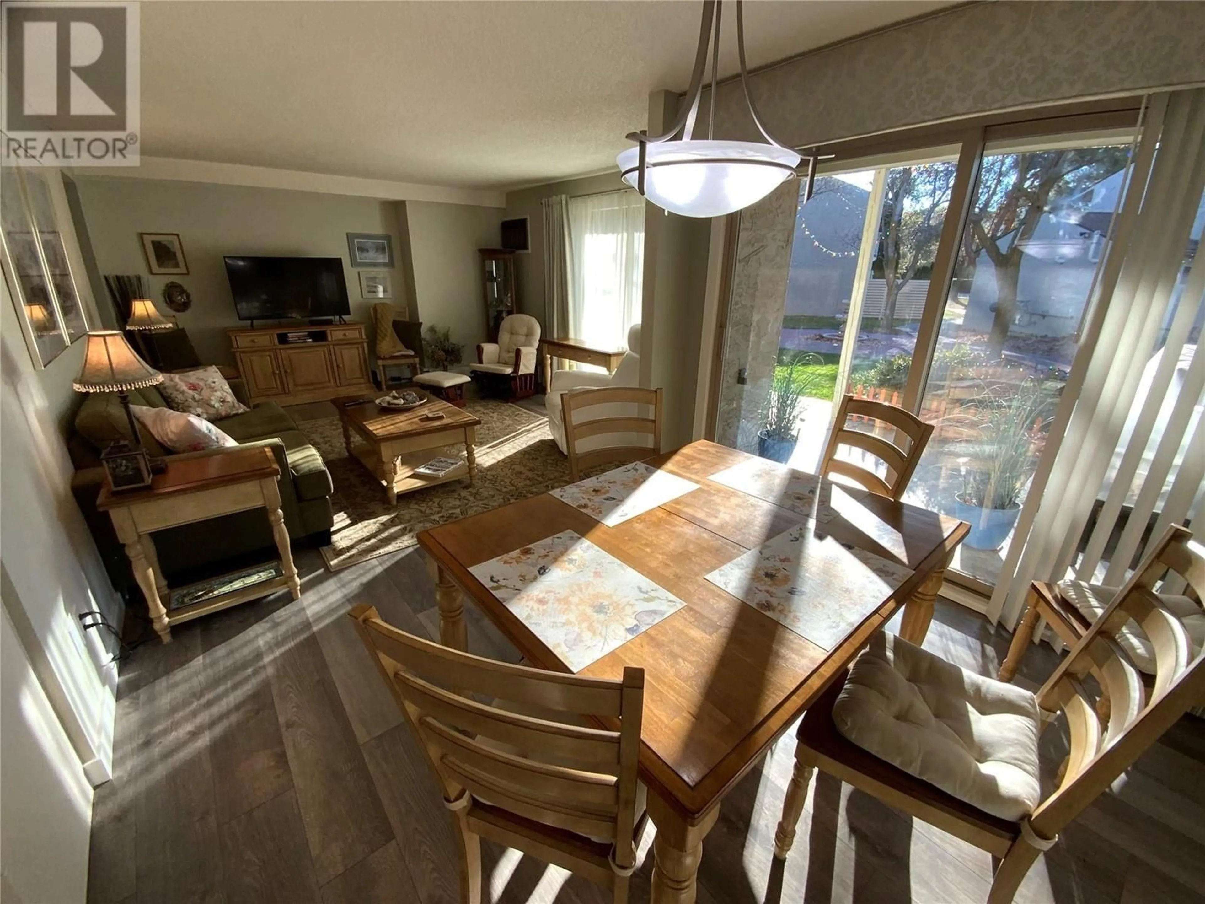 Dining room, wood floors, cottage for 310 YORKTON Avenue Unit# 45, Penticton British Columbia V2A6Z8