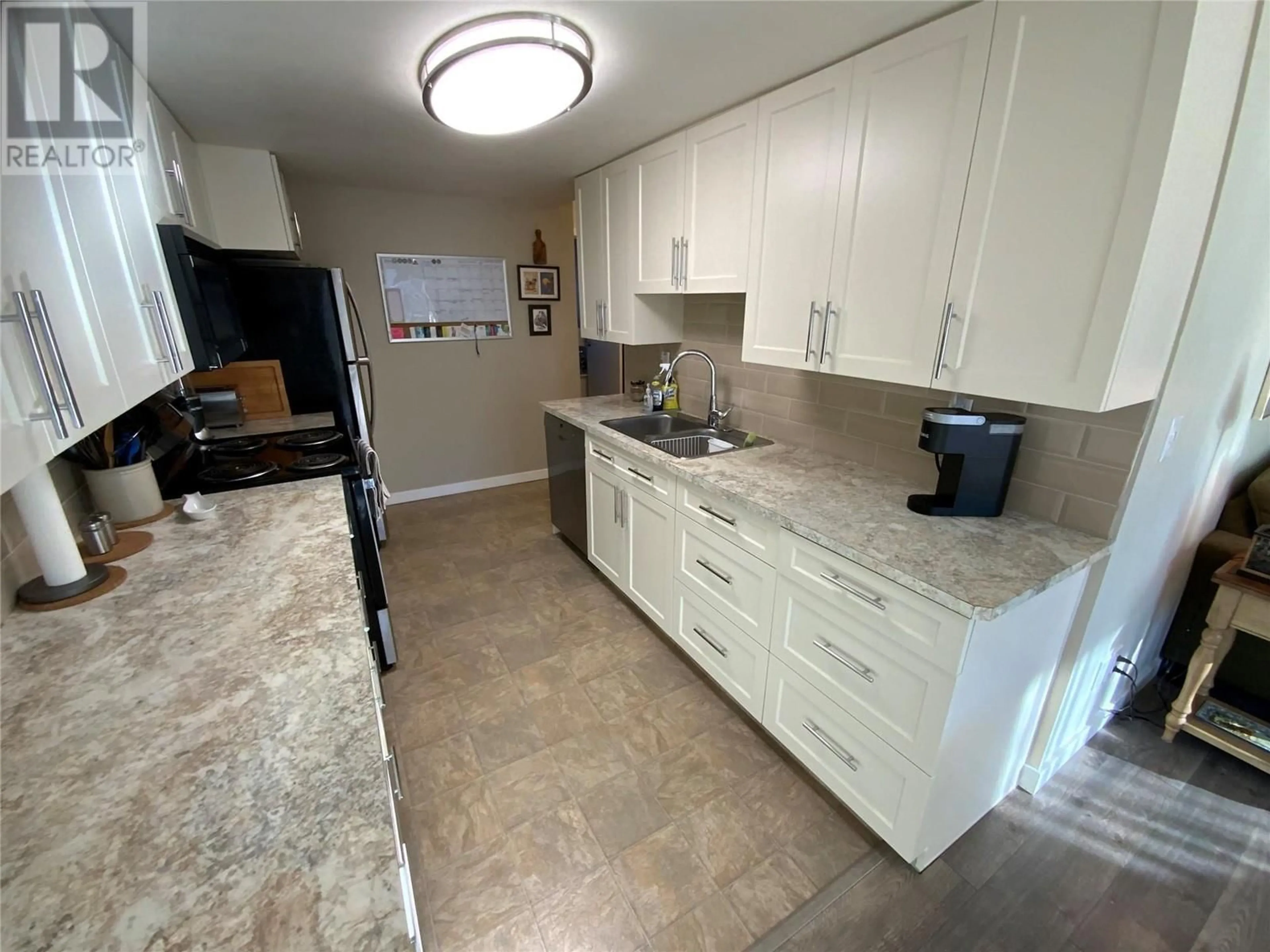 Kitchen, wood floors, cottage for 310 YORKTON Avenue Unit# 45, Penticton British Columbia V2A6Z8