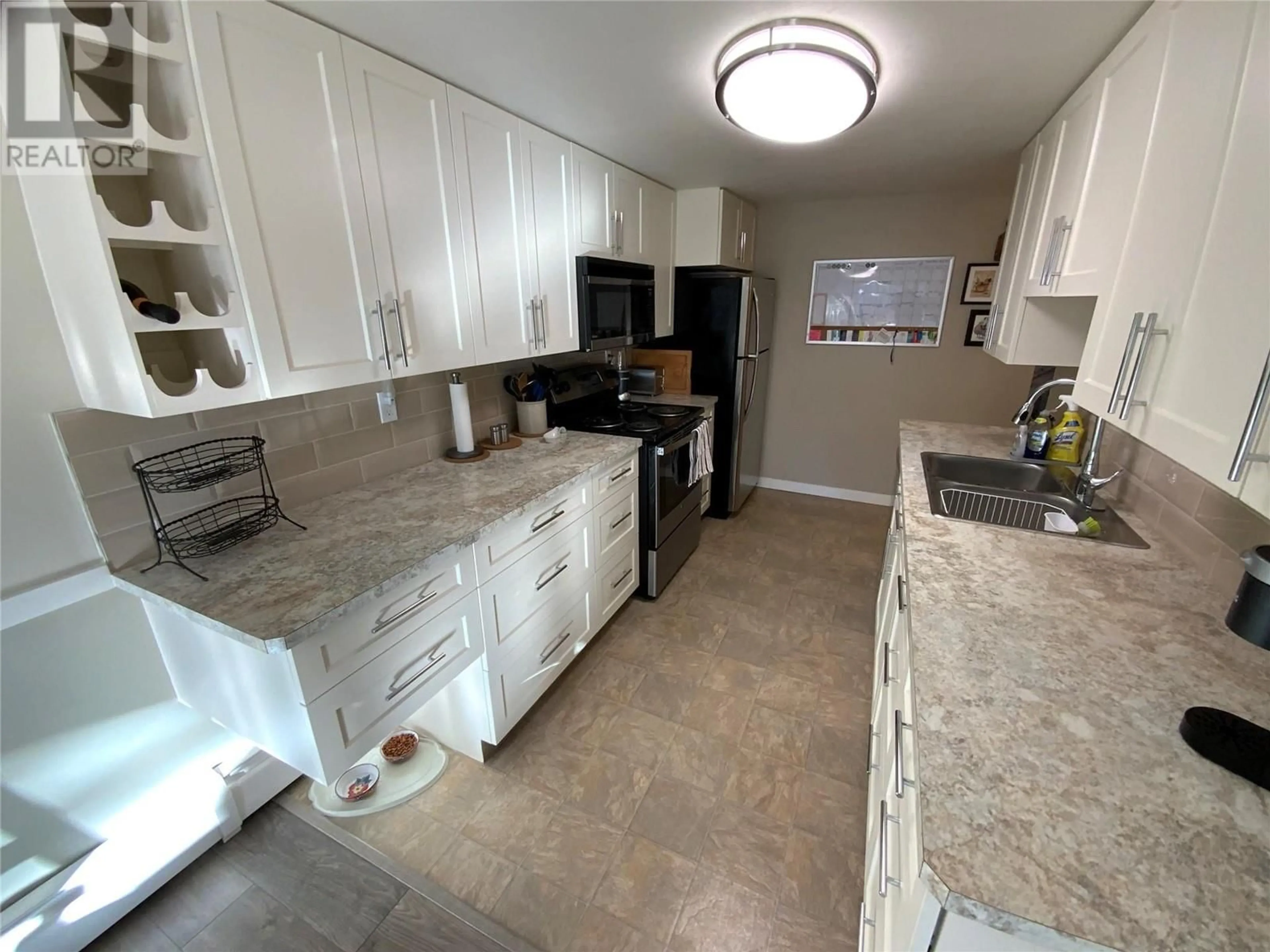 Kitchen, ceramic floors, cottage for 310 YORKTON Avenue Unit# 45, Penticton British Columbia V2A6Z8