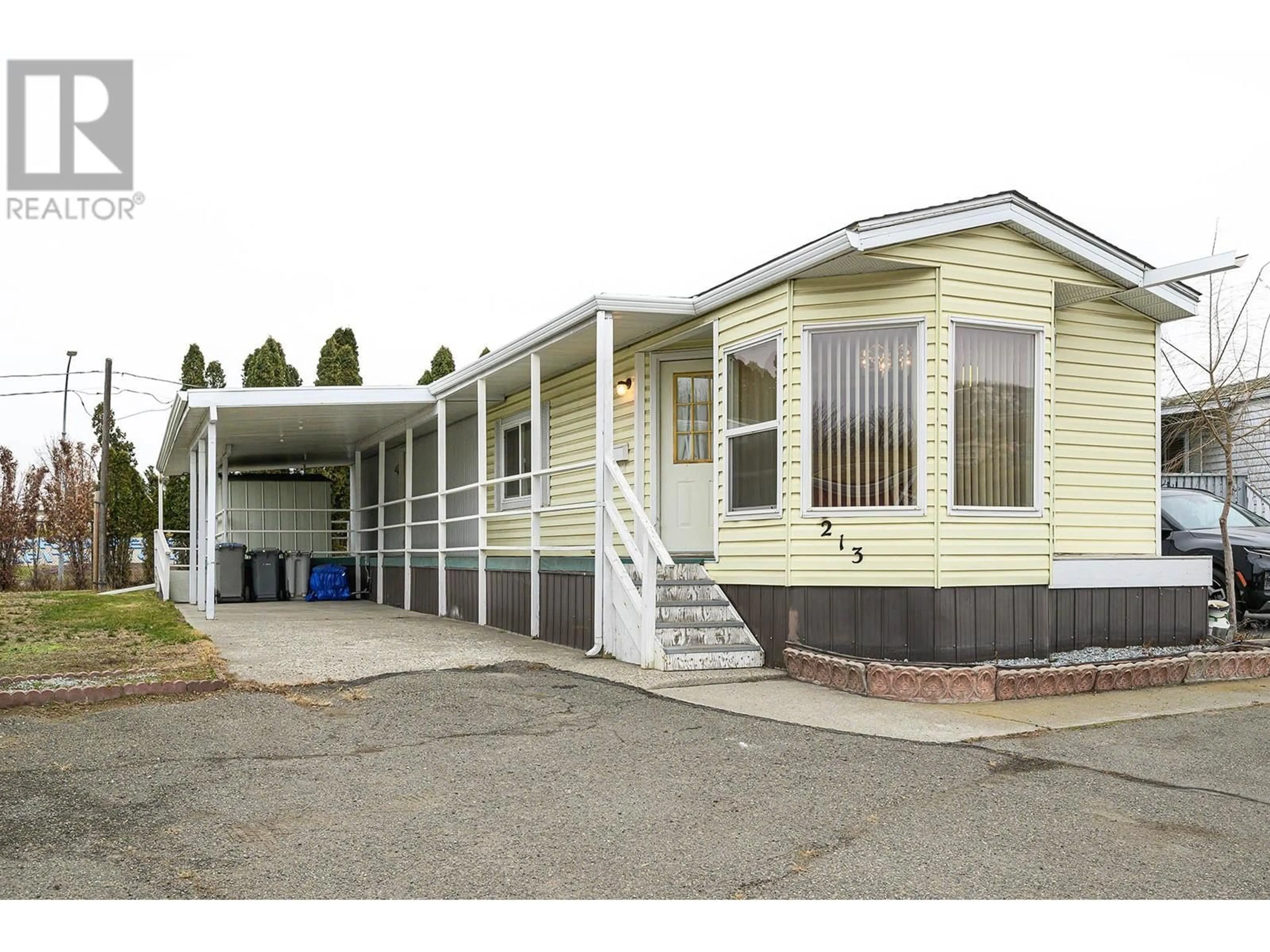 Home with vinyl exterior material, street for 213 UNIVERSAL Way Unit# 213U, Kamloops British Columbia V2B1A5