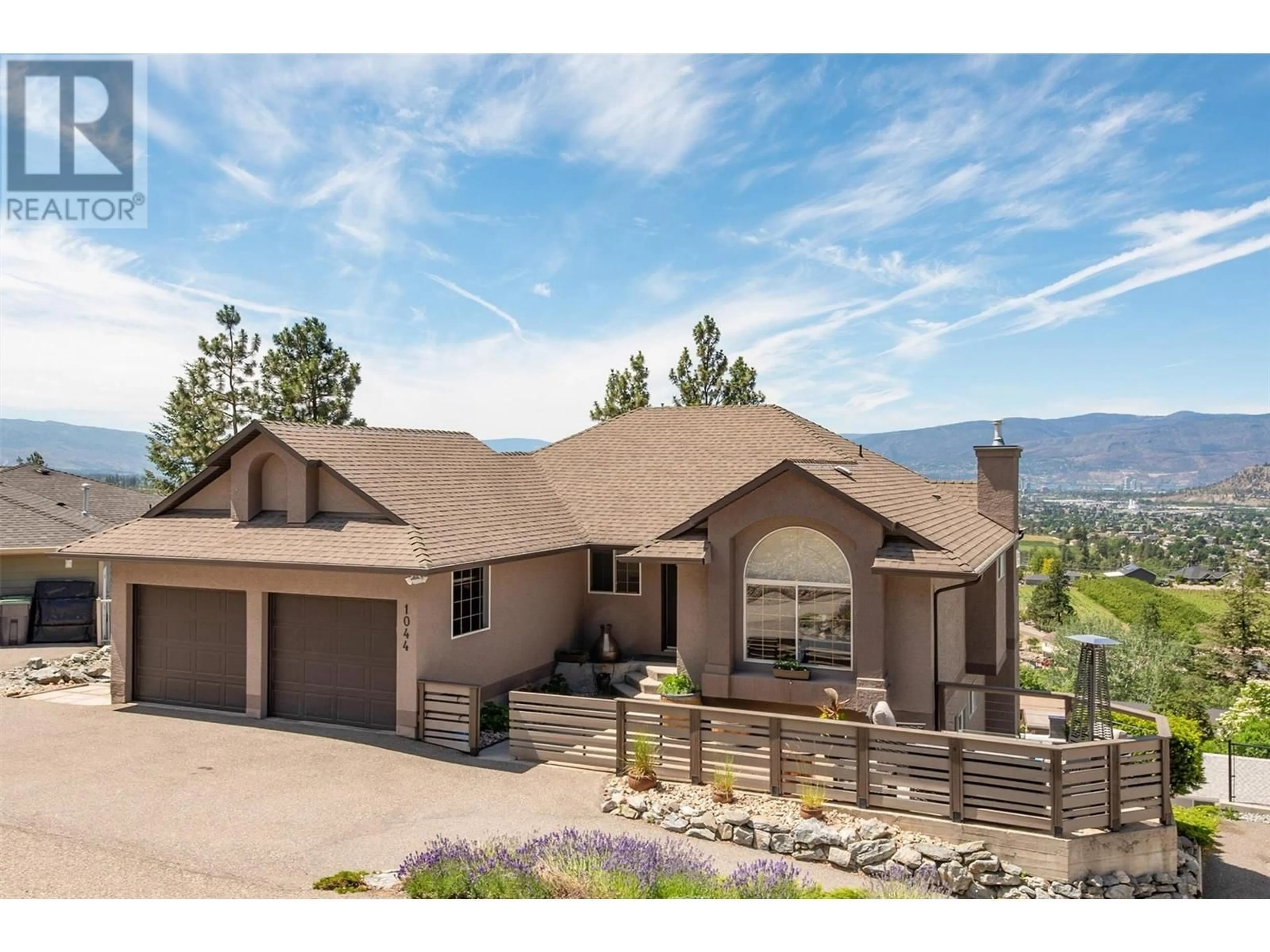 Home with vinyl exterior material, mountain view for 1044 James Hockey Place, Kelowna British Columbia V1X7L2