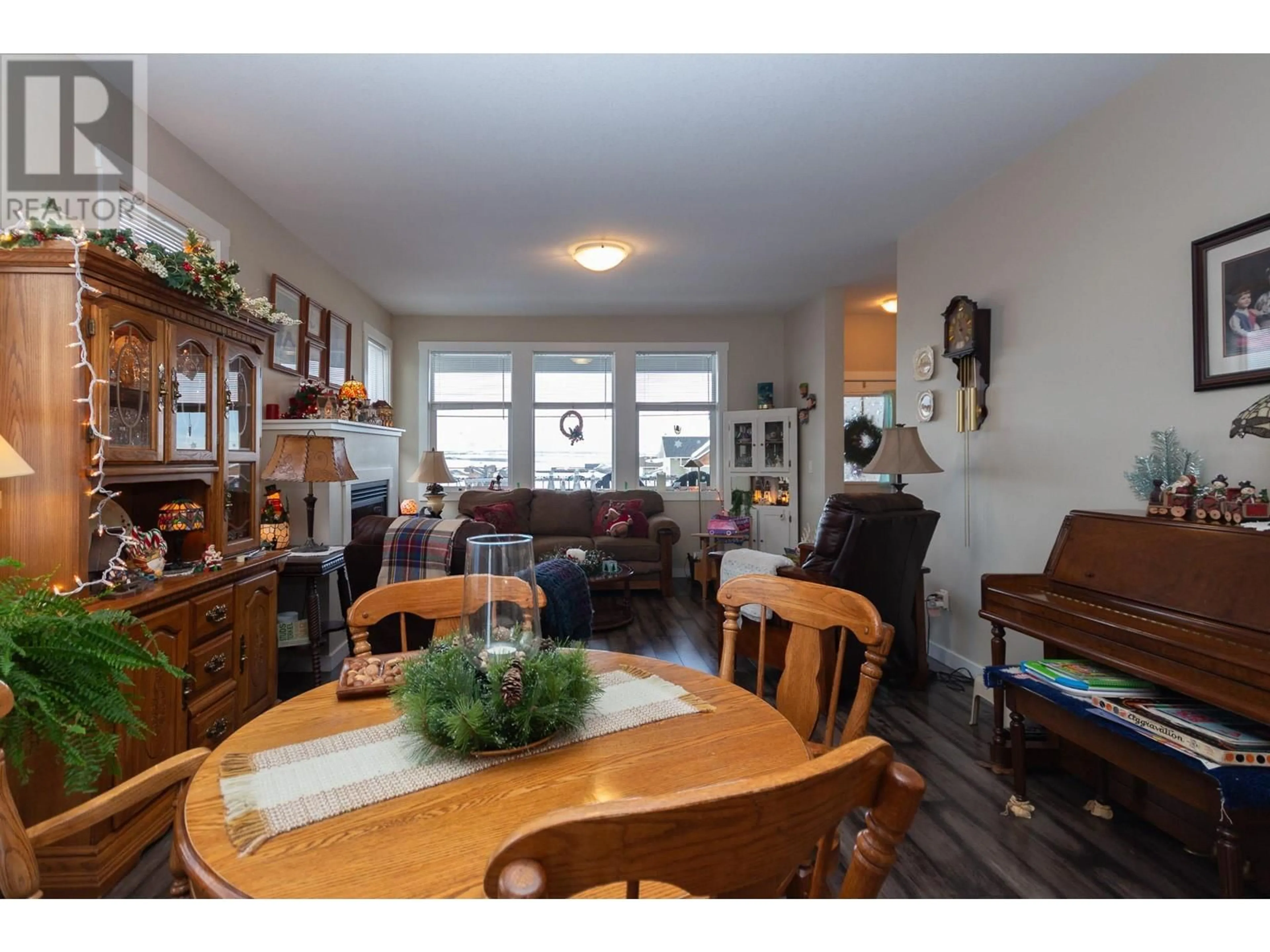 Dining room, wood/laminate floor for 8804 17 Street, Dawson Creek British Columbia V1G0H2