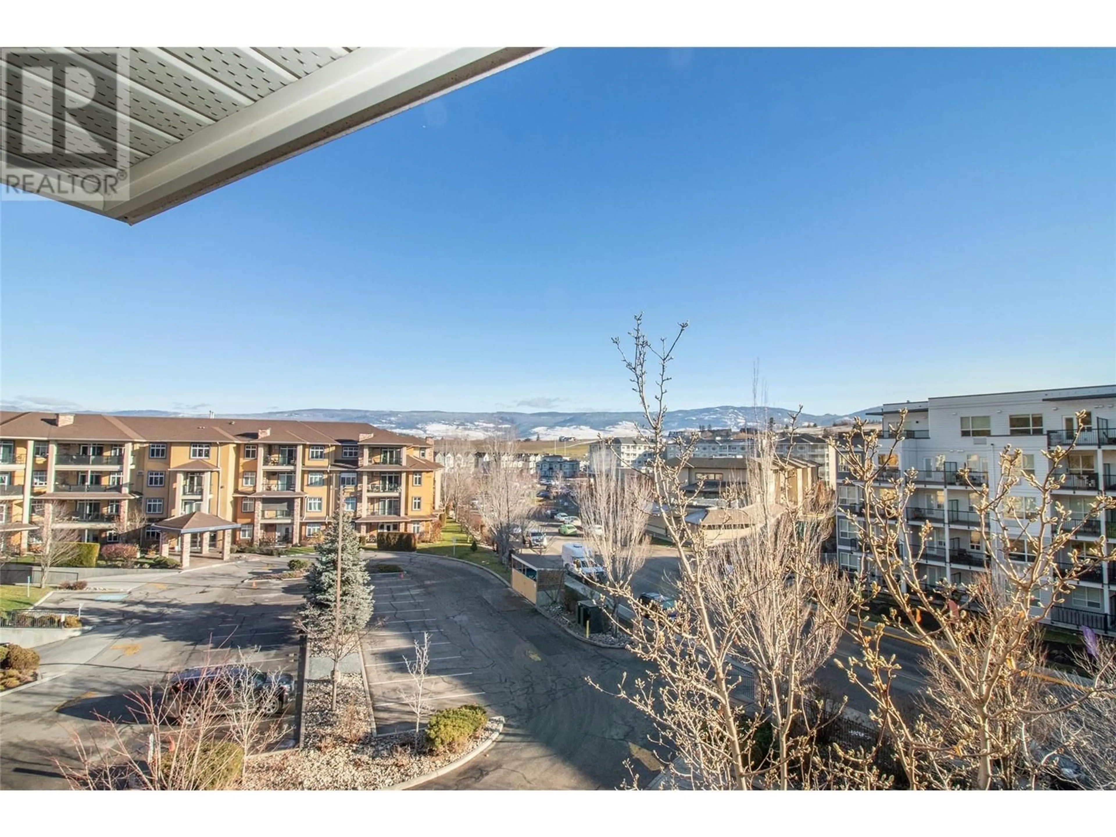 A pic from outside/outdoor area/front of a property/back of a property/a pic from drone, city buildings view from balcony for 303 Whitman Road Unit# 403, Kelowna British Columbia V1V2P3