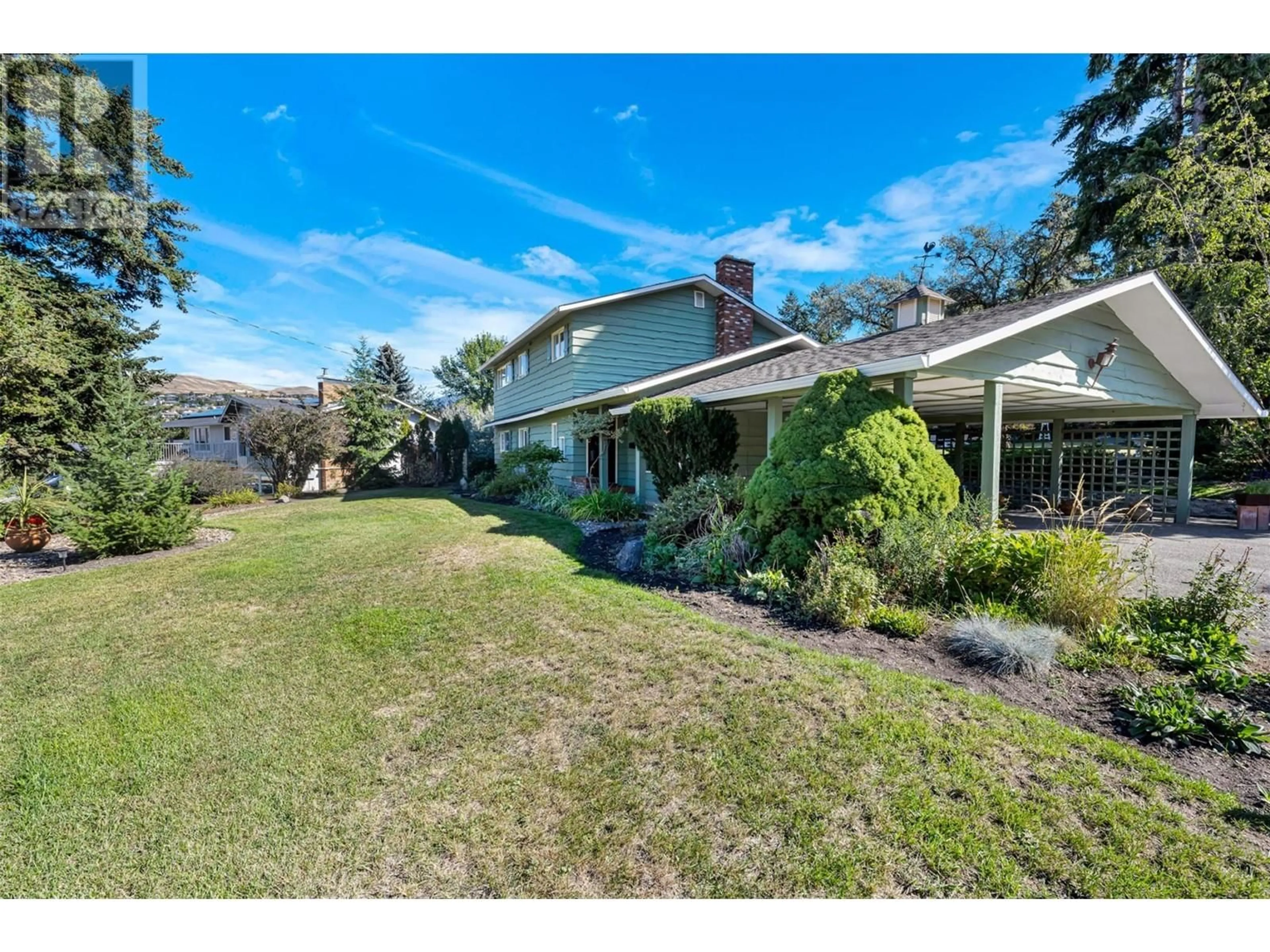 A pic from outside/outdoor area/front of a property/back of a property/a pic from drone, unknown for 7701 Holtam Drive, Coldstream British Columbia V1B1T5