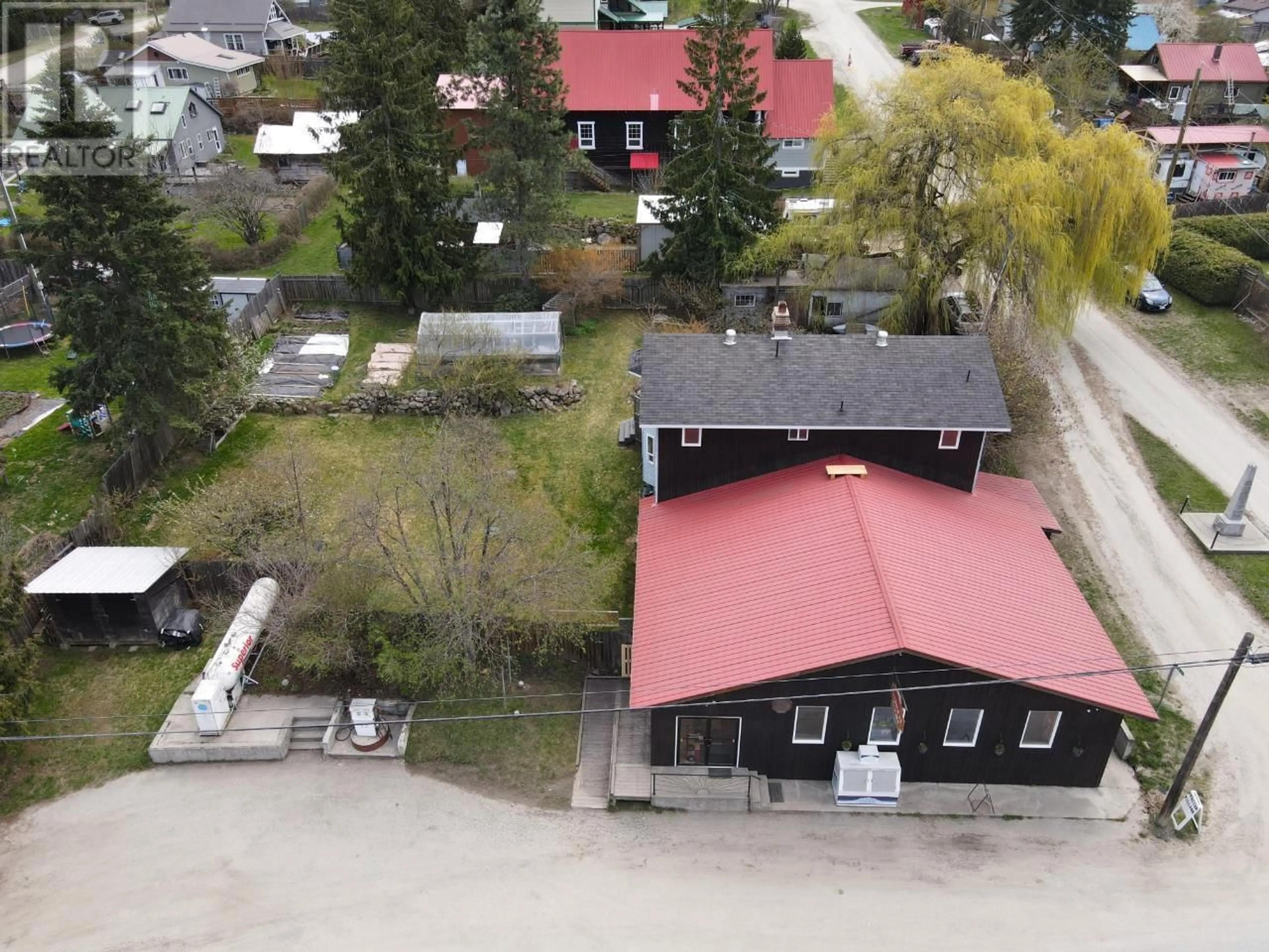 A pic from outside/outdoor area/front of a property/back of a property/a pic from drone, unknown for 7904 Railway Avenue Avenue, Procter British Columbia V1L0B7