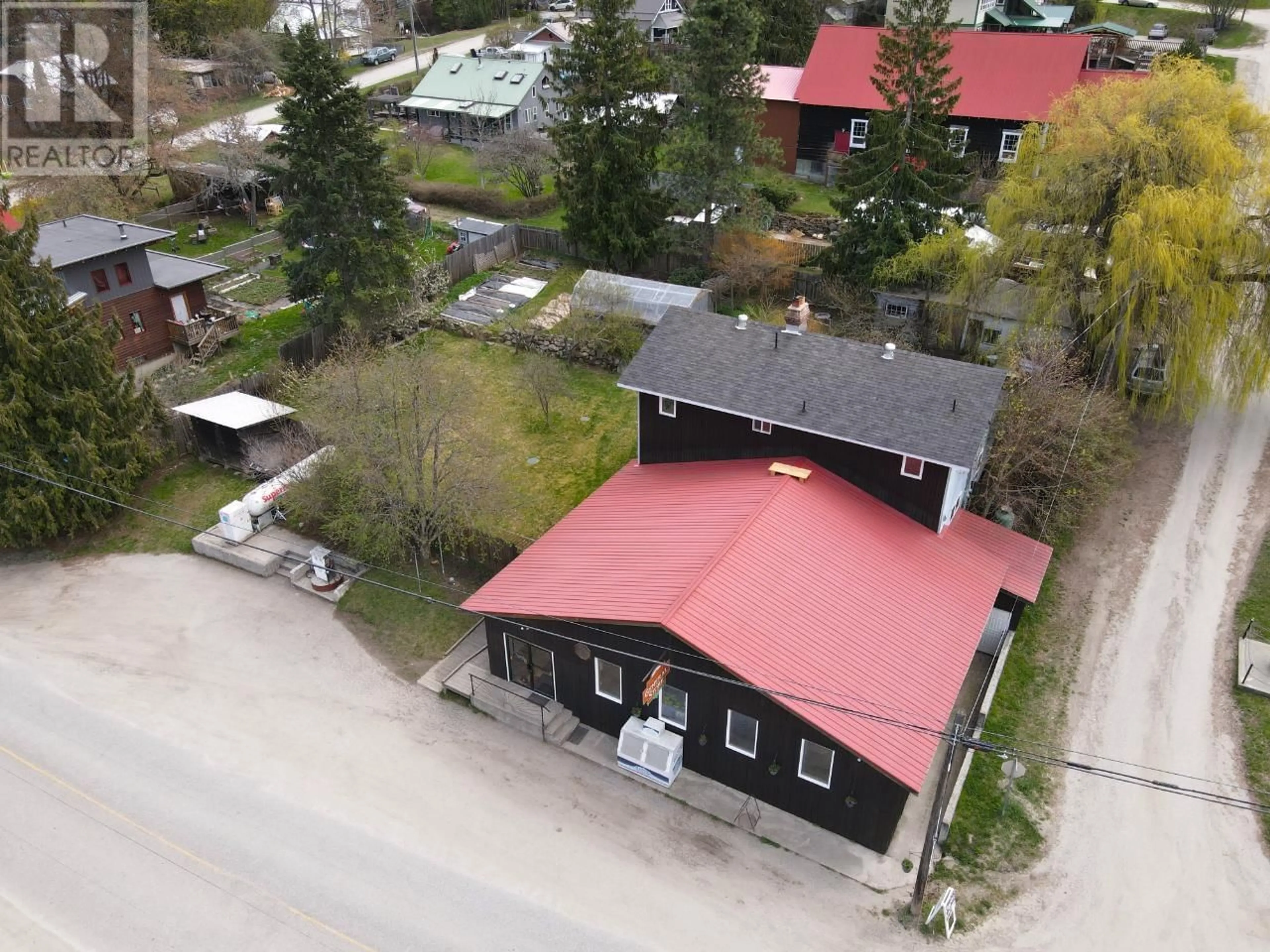 A pic from outside/outdoor area/front of a property/back of a property/a pic from drone, street for 7904 Railway Avenue Avenue, Procter British Columbia V1L0B7