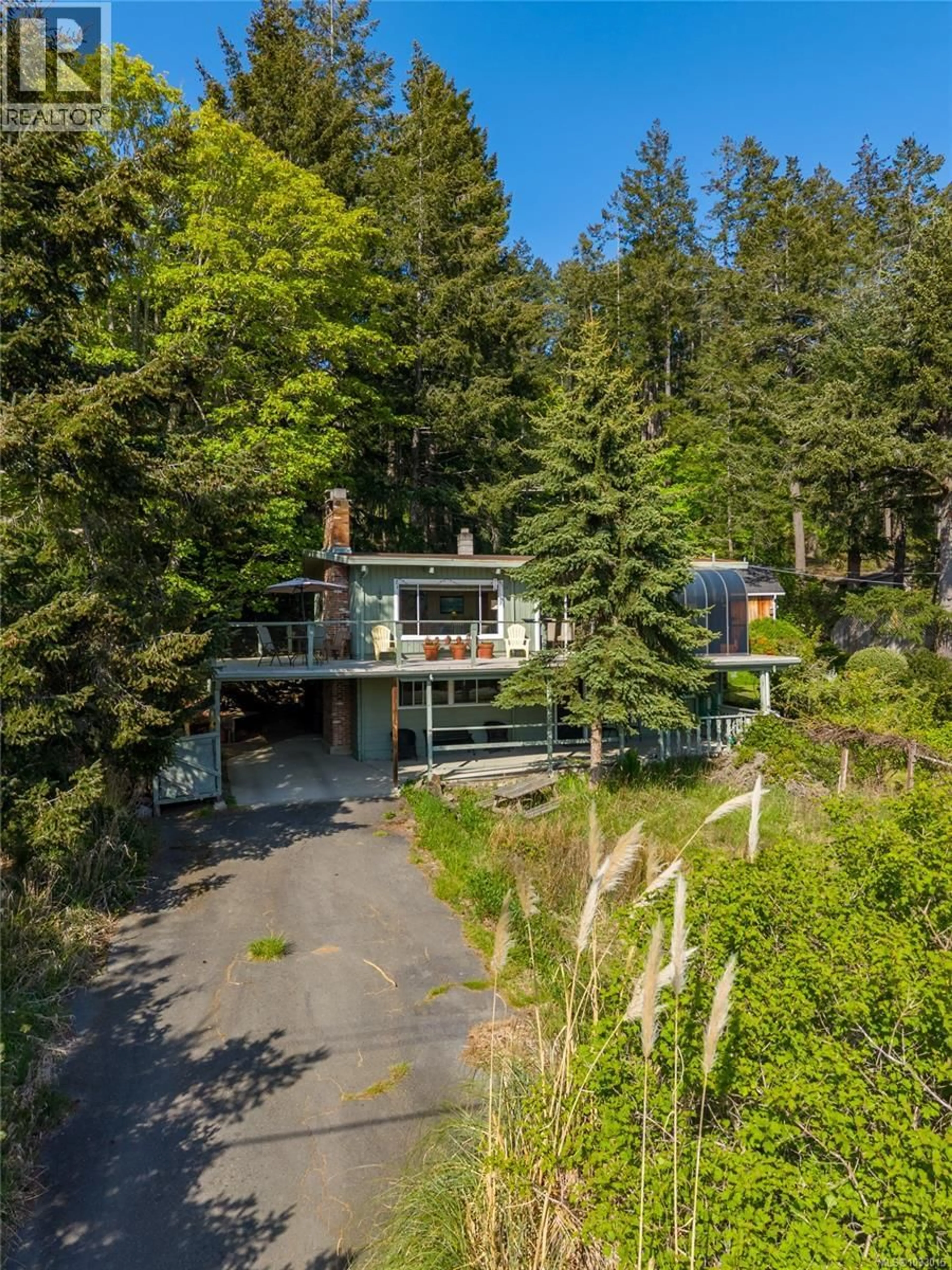A pic from outside/outdoor area/front of a property/back of a property/a pic from drone, unknown for 27146 SCHOONER WAY, Pender Island British Columbia V0N2M2