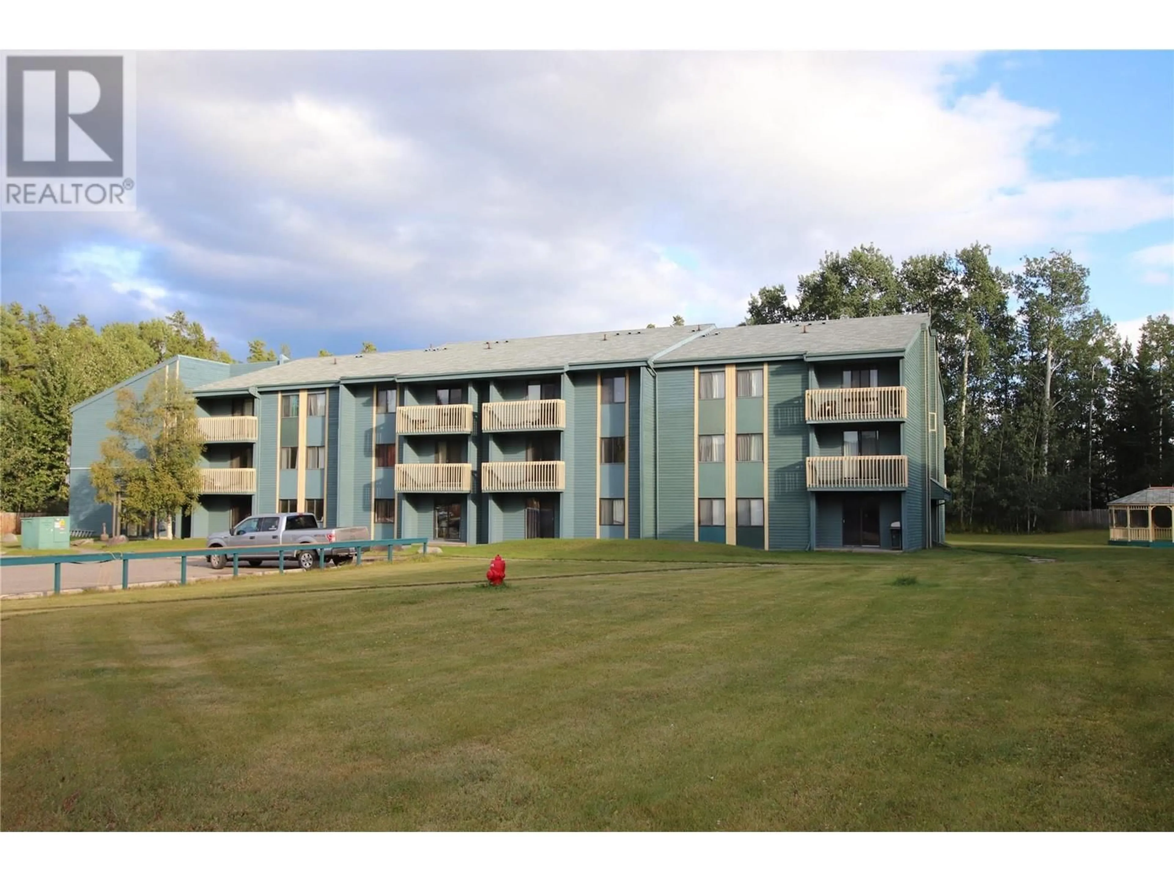 A pic from outside/outdoor area/front of a property/back of a property/a pic from drone, building for 216 Spieker Avenue Unit# 307, Tumbler Ridge British Columbia V0C2W0