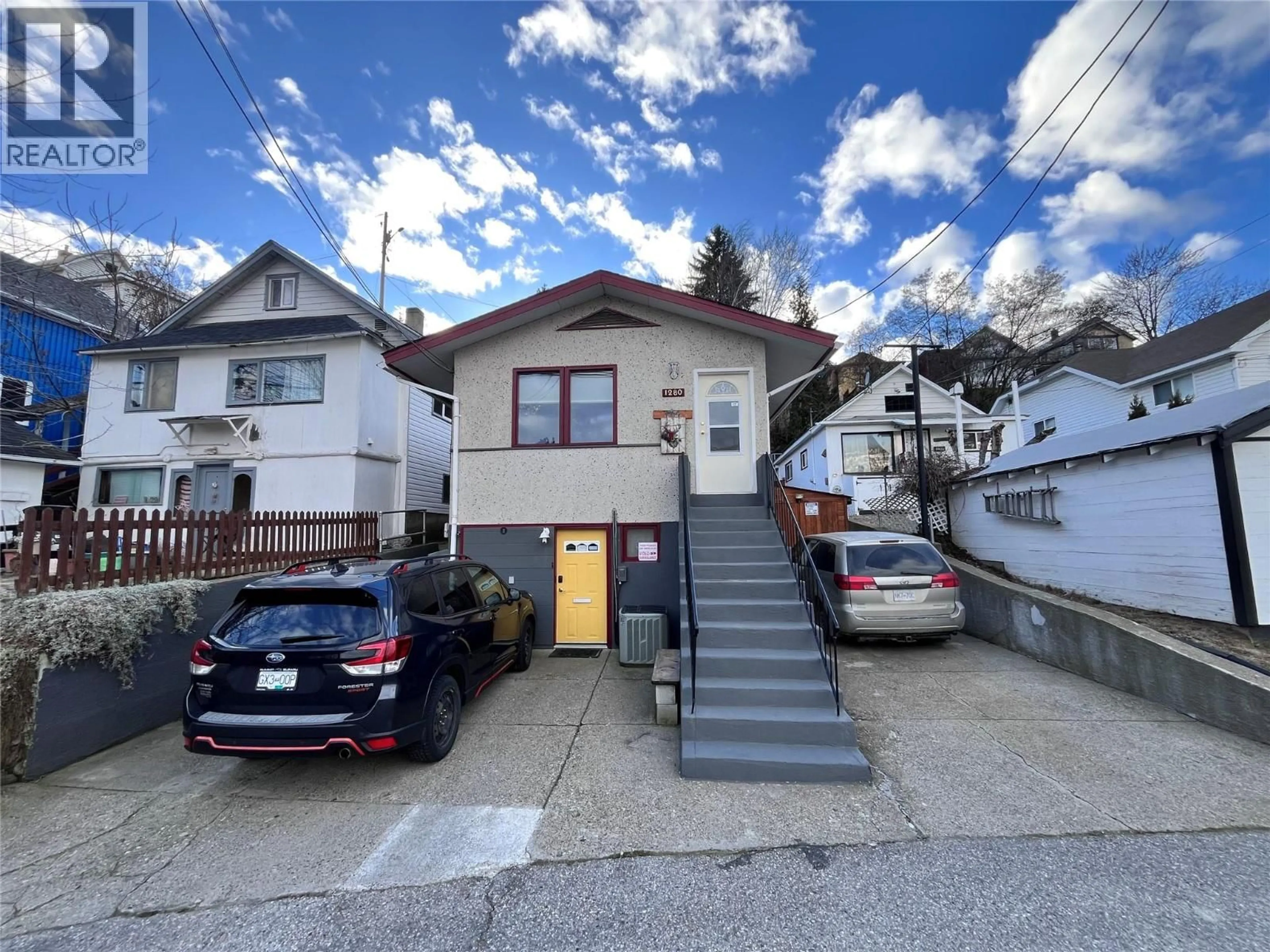 A pic from outside/outdoor area/front of a property/back of a property/a pic from drone, street for 1280 GREEN AVENUE, Trail British Columbia V1R4K1