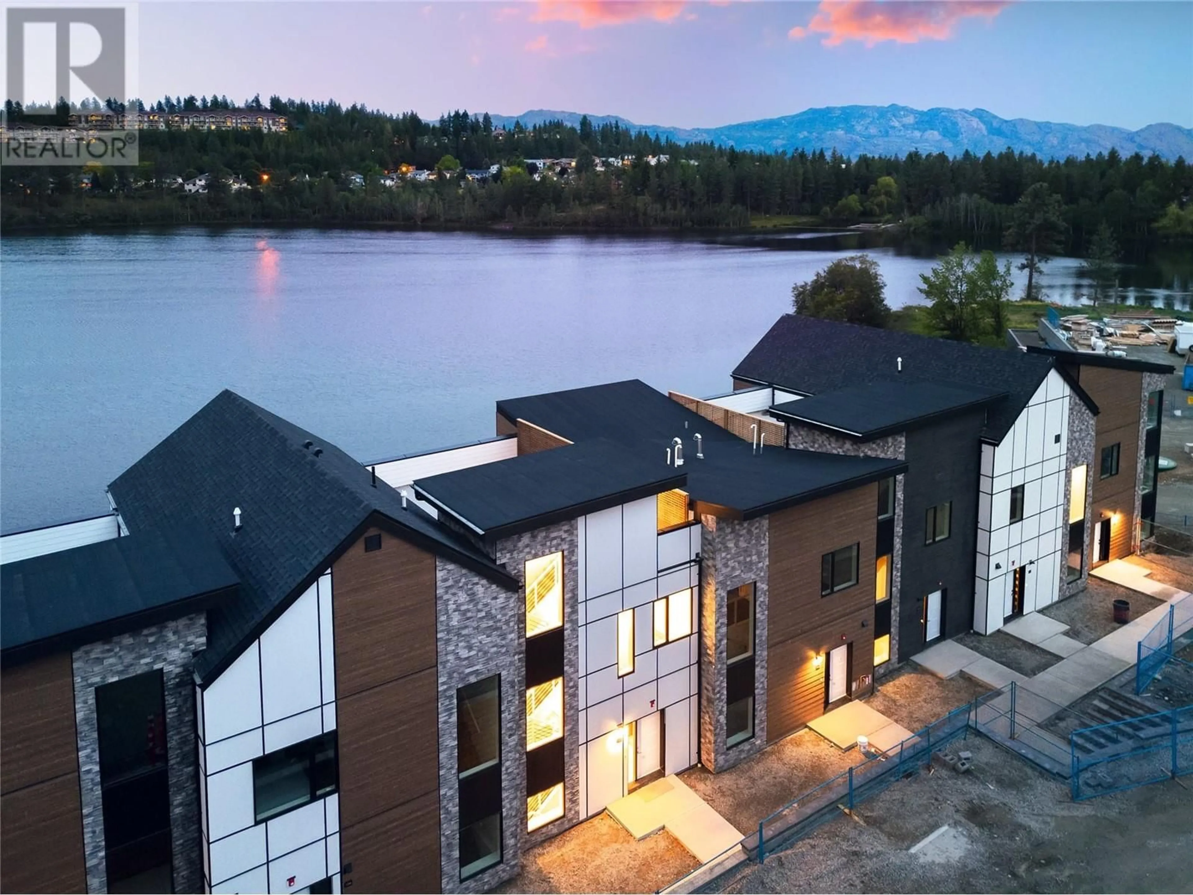 A pic from outside/outdoor area/front of a property/back of a property/a pic from drone, water/lake/river/ocean view for 105 - 2735 SHANNON LAKE ROAD, West Kelowna British Columbia V4T1V6