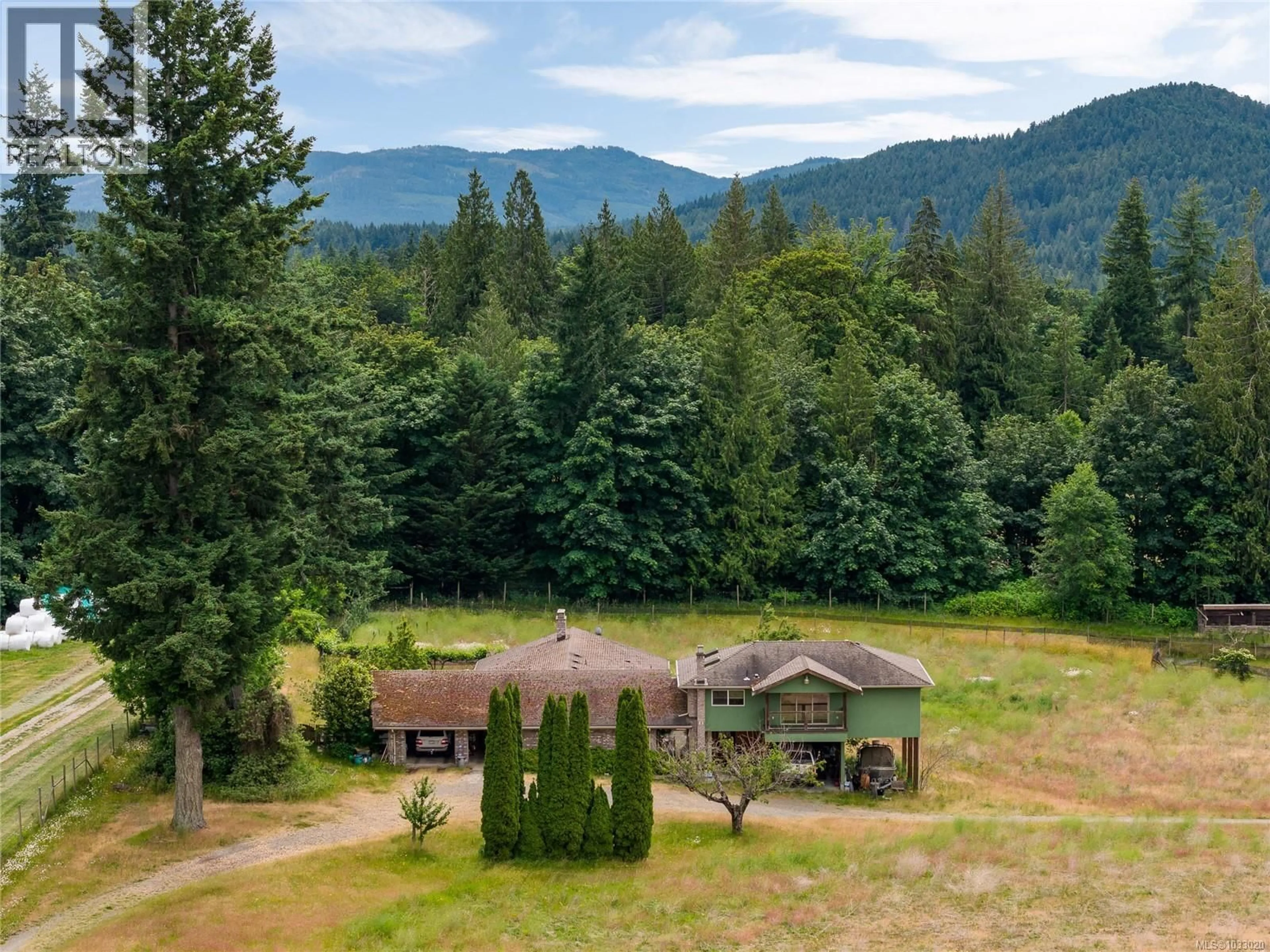 A pic from outside/outdoor area/front of a property/back of a property/a pic from drone, mountain view for 1550 ROBSON LANE SOUTH, Cowichan Bay British Columbia V0R1N1