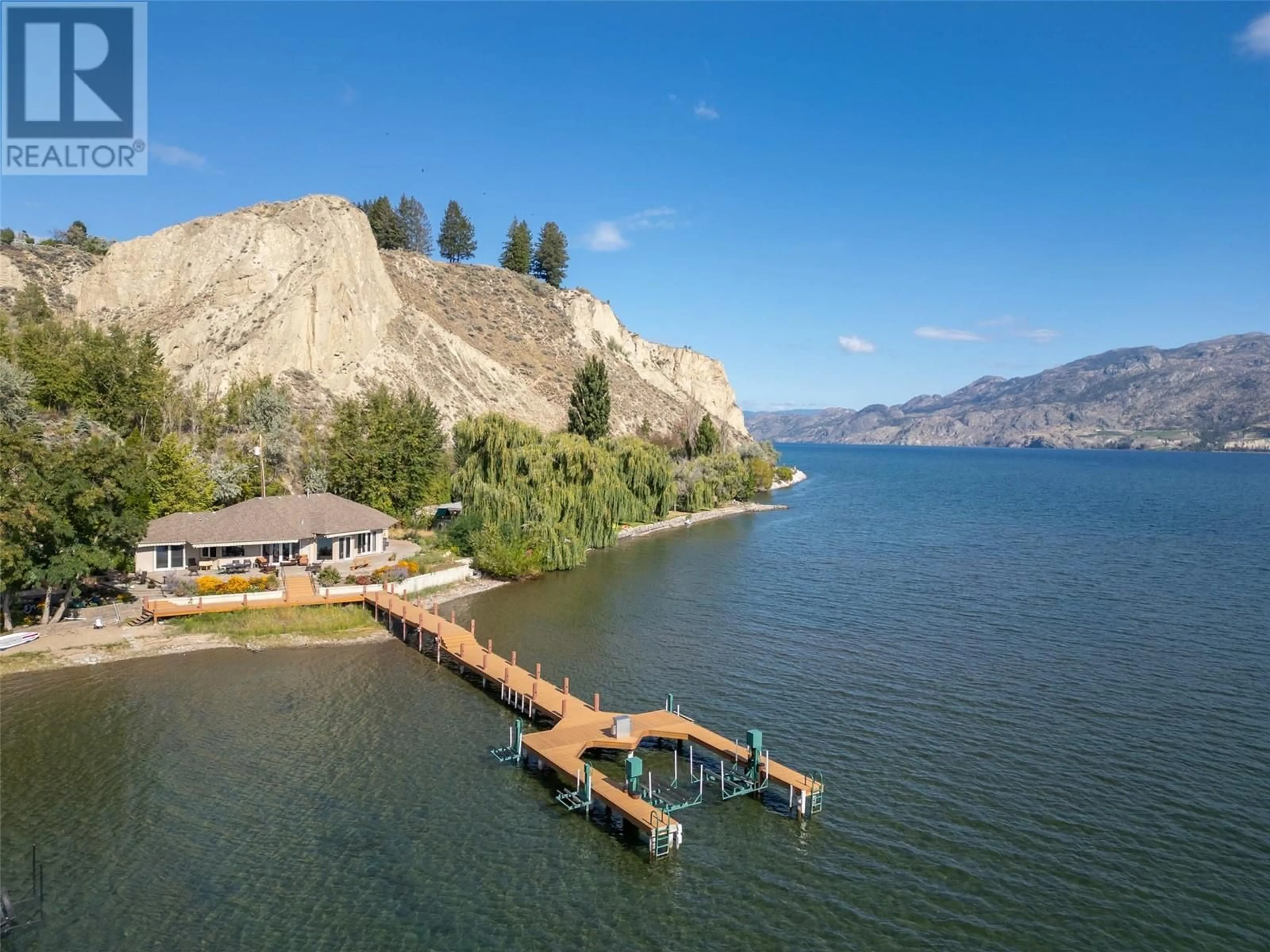 A pic from outside/outdoor area/front of a property/back of a property/a pic from drone, water/lake/river/ocean view for 17019 Lakeshore Drive N, Summerland British Columbia V0H1Z6