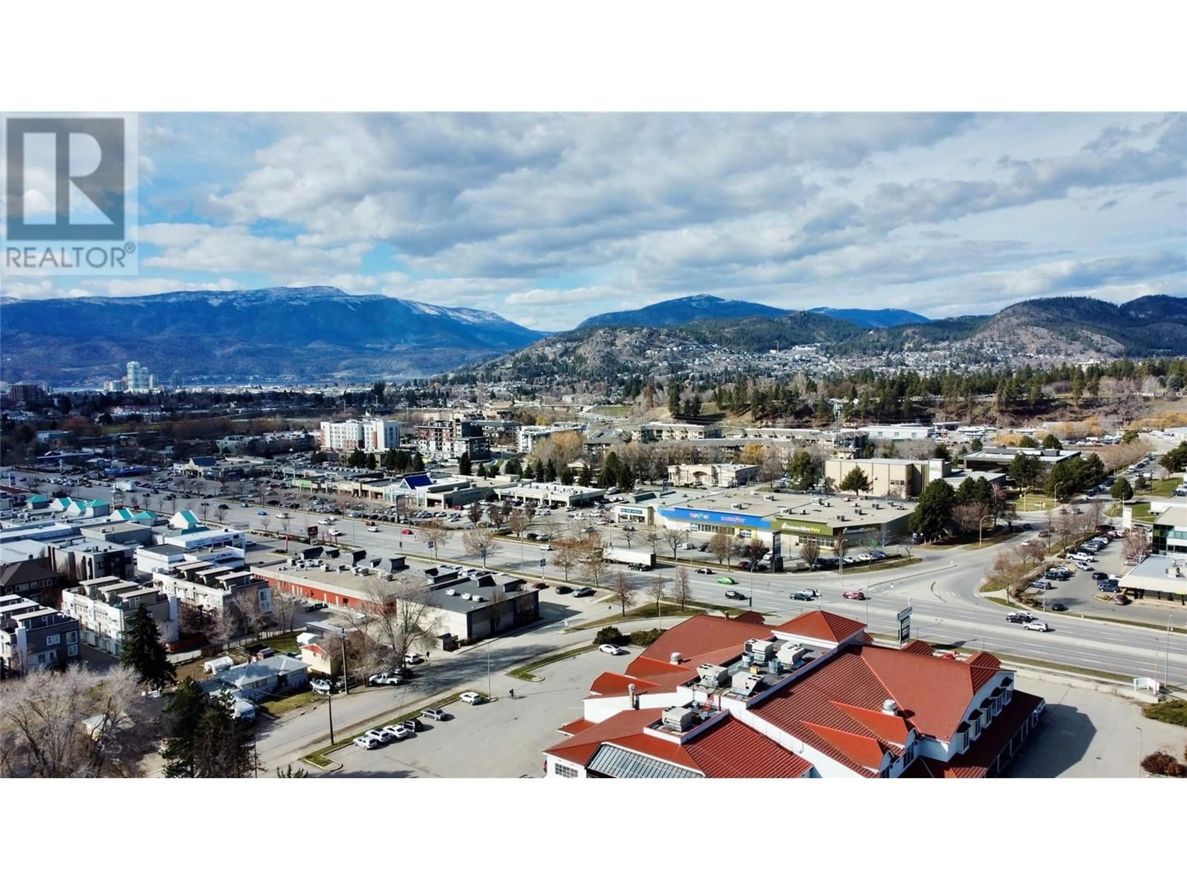 A pic from outside/outdoor area/front of a property/back of a property/a pic from drone, mountain view for 2110 Vasile Road, Kelowna British Columbia V1Y6H5