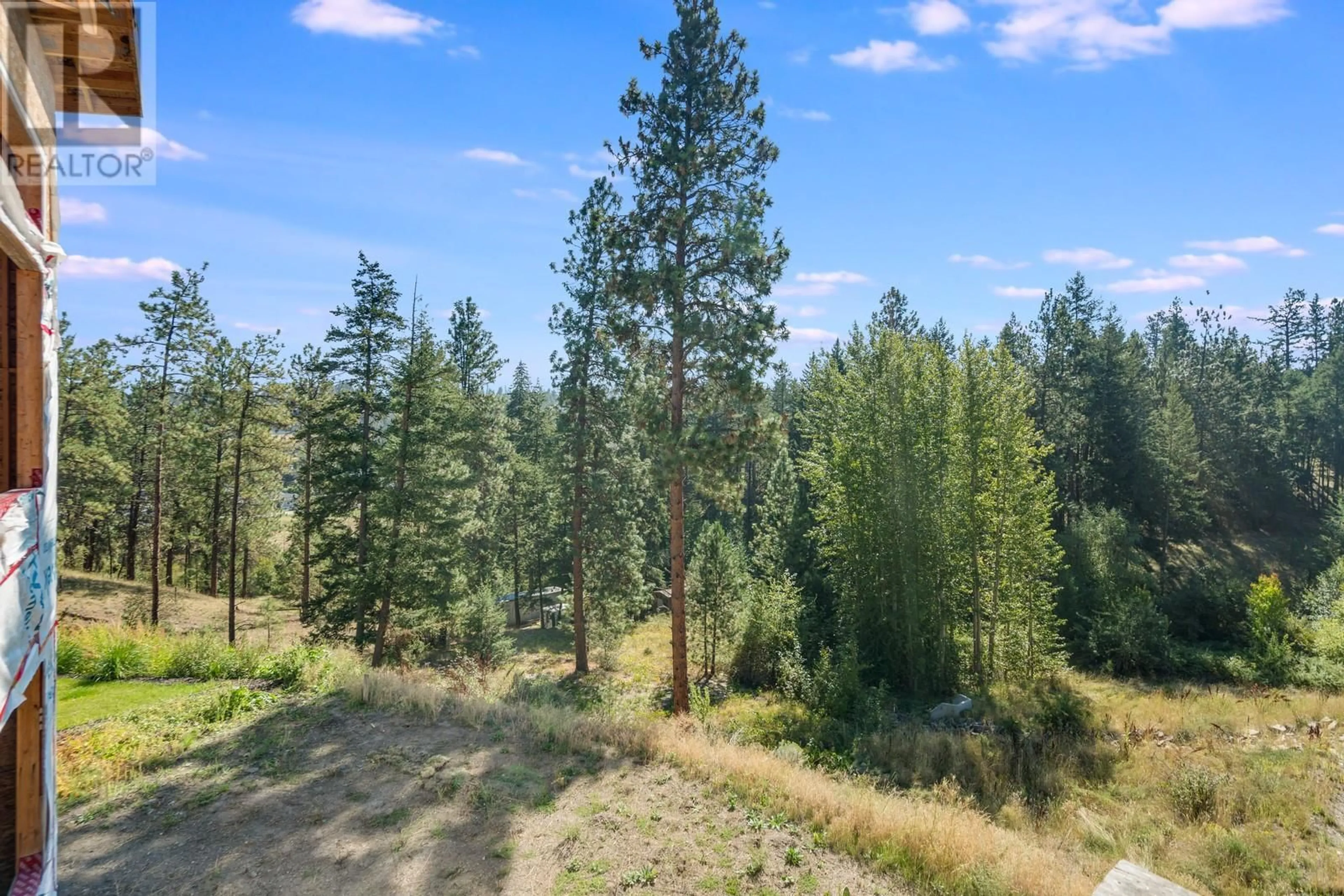 A pic from outside/outdoor area/front of a property/back of a property/a pic from drone, forest/trees view for 830 Westview Way Unit# 21, West Kelowna British Columbia V1Z0A5