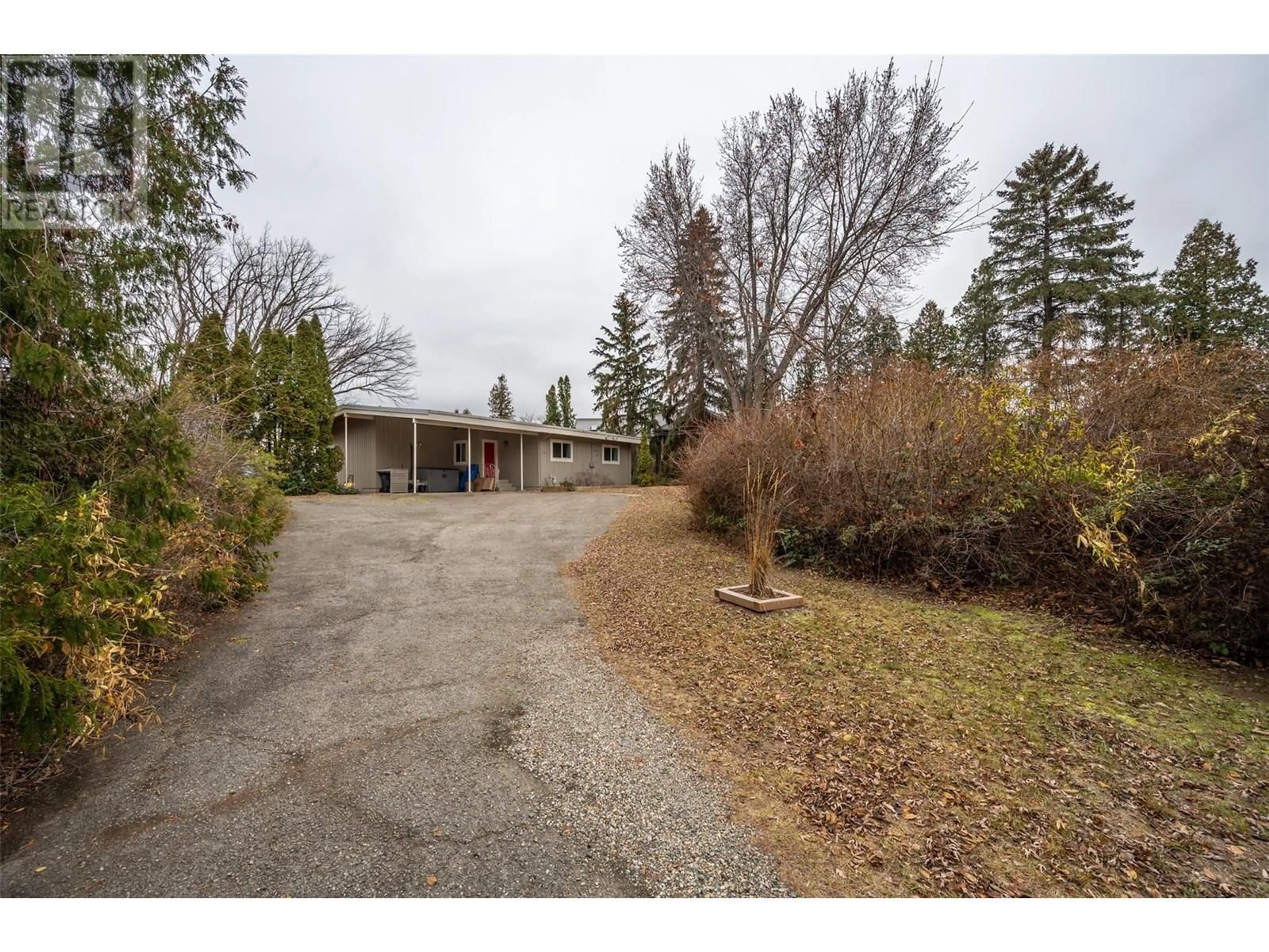 A pic from outside/outdoor area/front of a property/back of a property/a pic from drone, street for 117 HYSLOP DRIVE, Penticton British Columbia V2A9A1