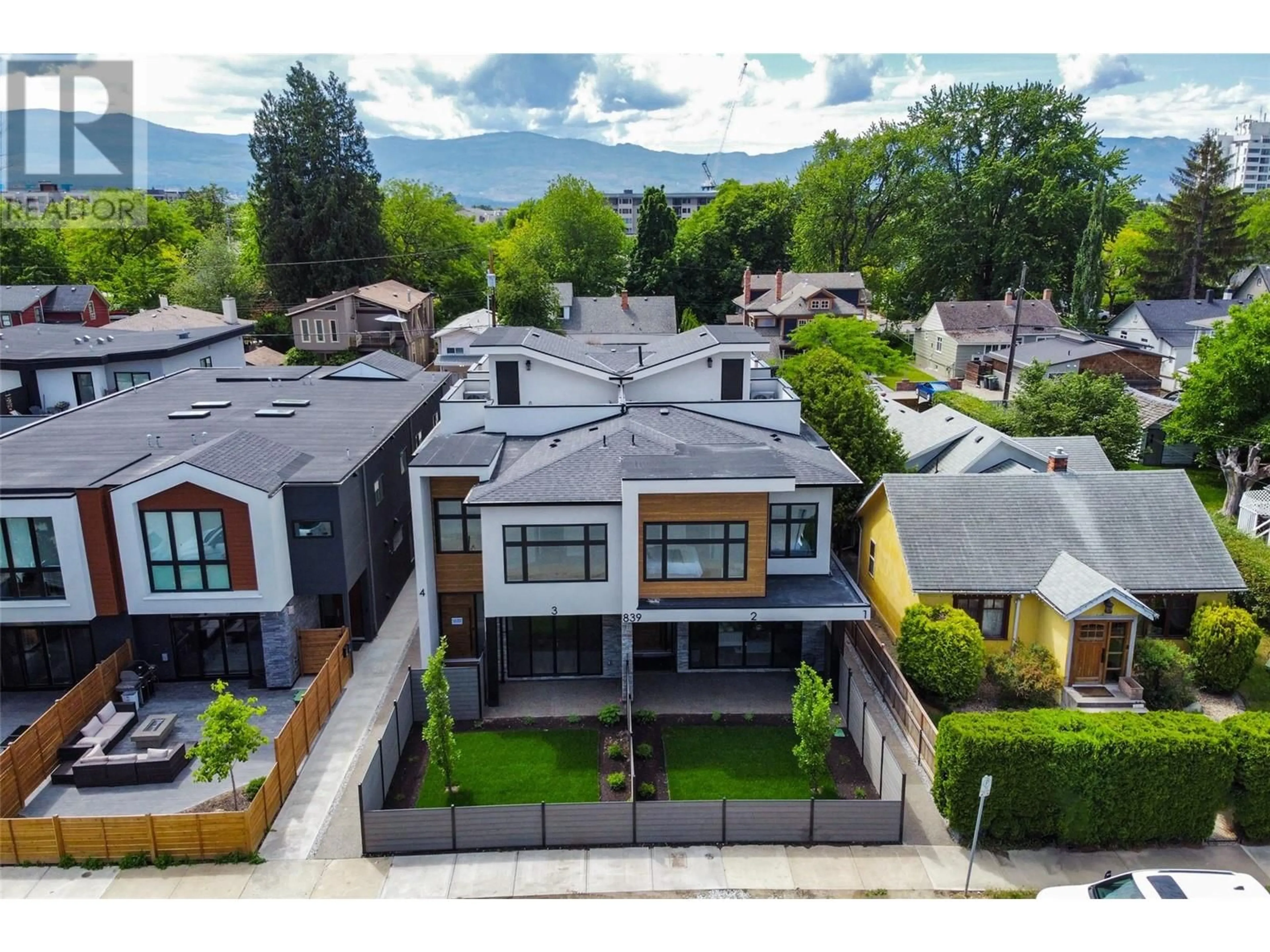 A pic from outside/outdoor area/front of a property/back of a property/a pic from drone, unknown for 839 Lawson Avenue Unit# 1, Kelowna British Columbia V1Y6S9