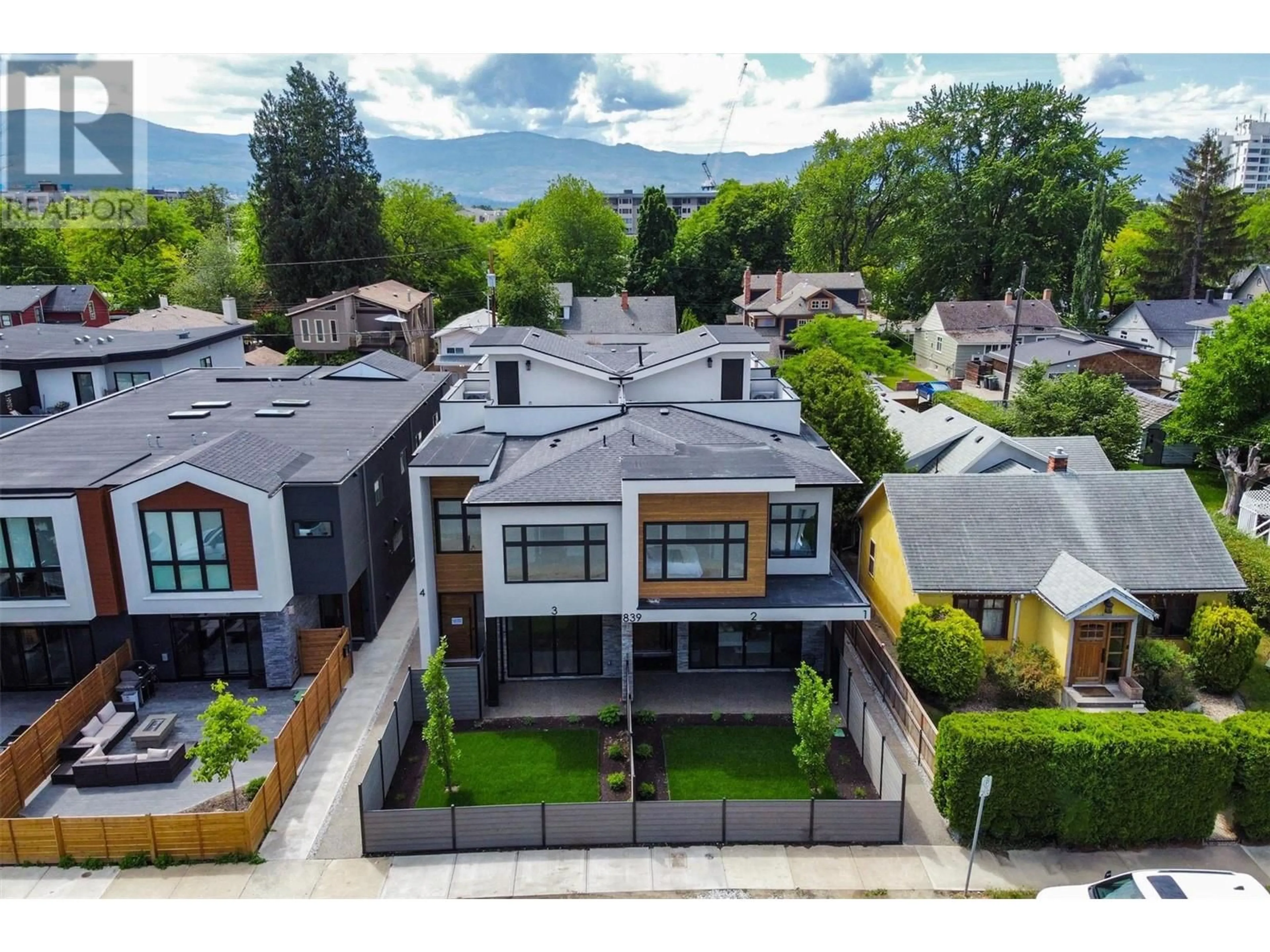 A pic from outside/outdoor area/front of a property/back of a property/a pic from drone, unknown for 839 Lawson Avenue Unit# 3, Kelowna British Columbia V1Y6S9