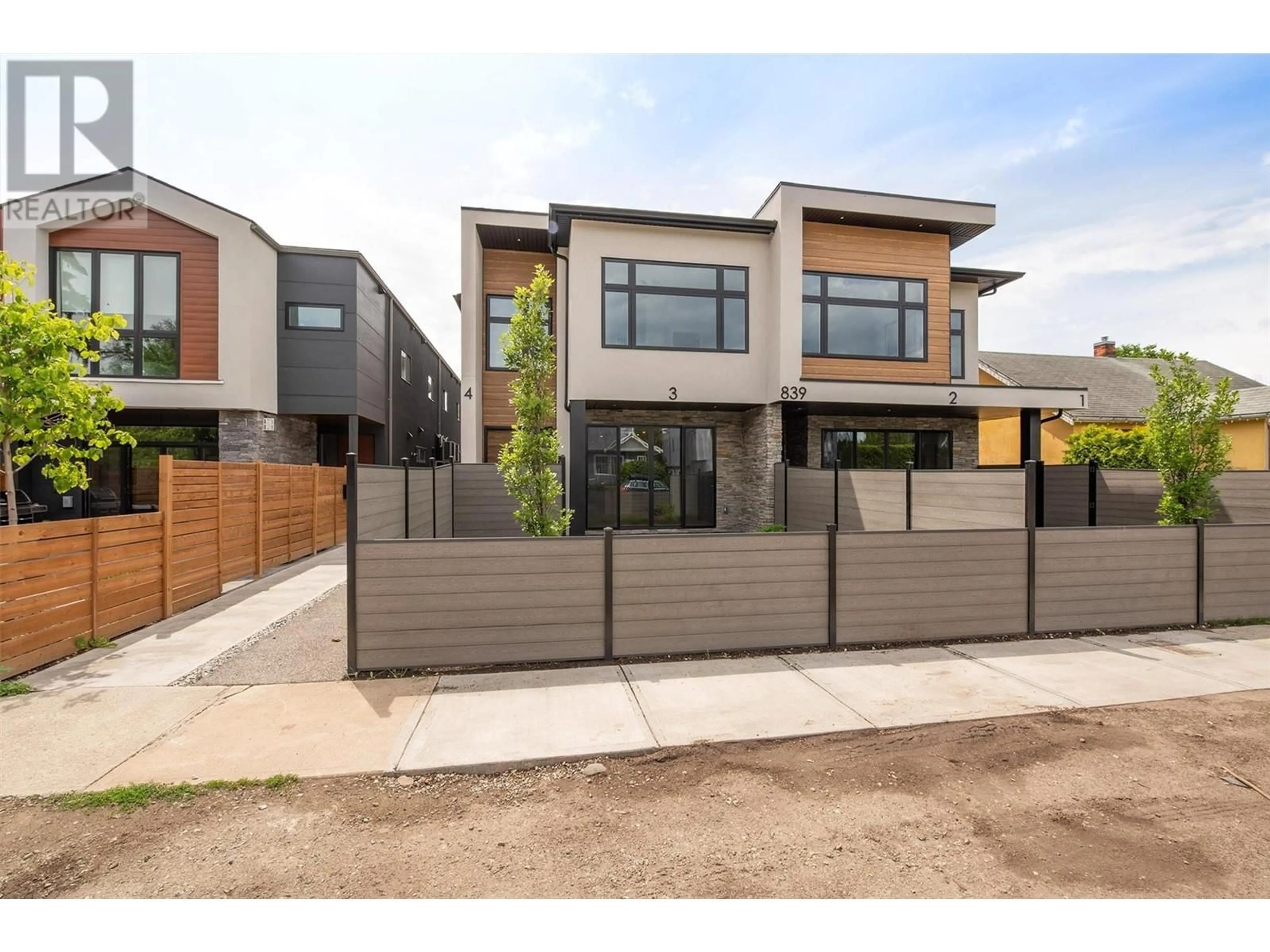 Home with brick exterior material, street for 839 Lawson Avenue Unit# 4, Kelowna British Columbia V1Y6S9